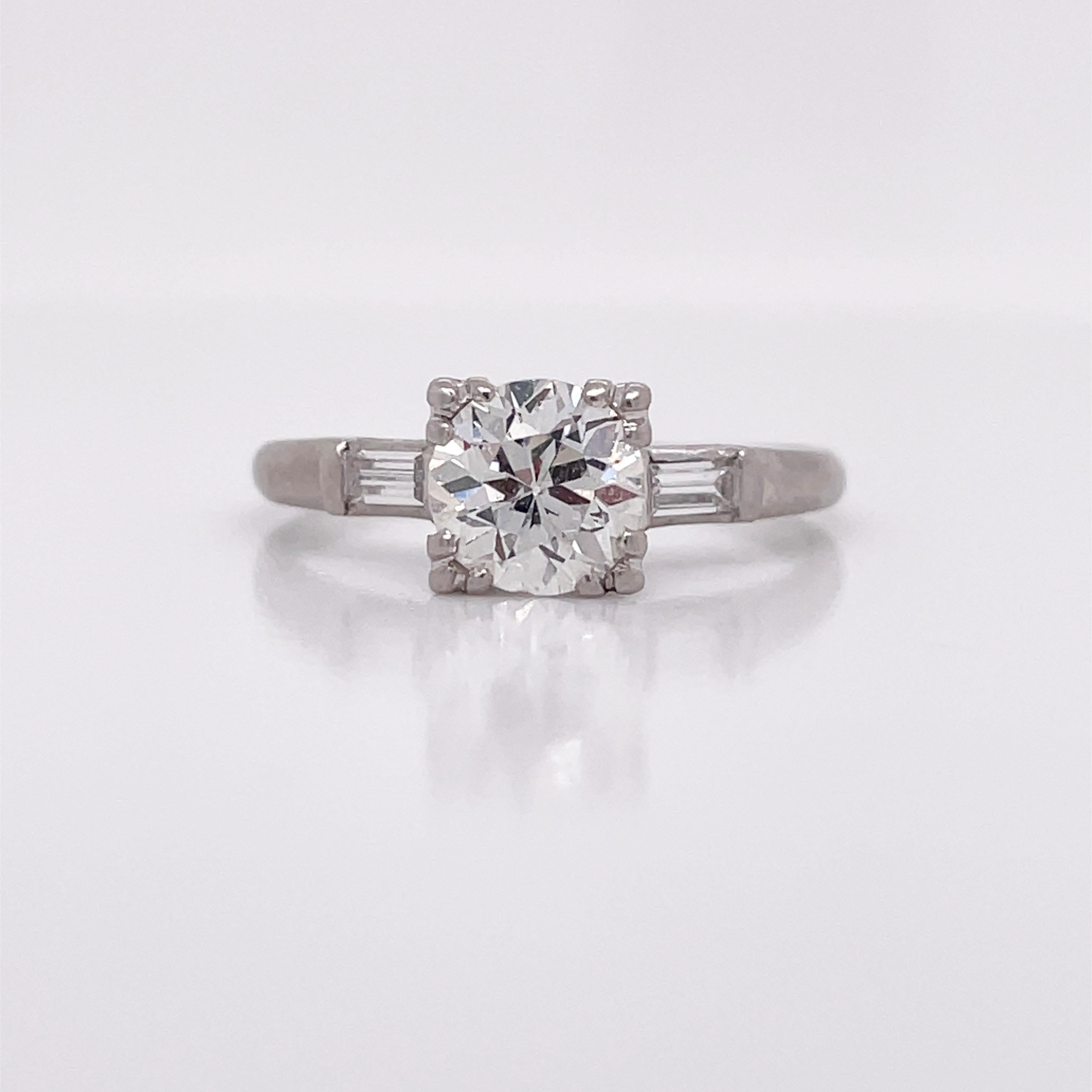 This is a magnificent Deco Engagement ring, dating back to the 1940s, set in platinum! This is the perfect ring to say 