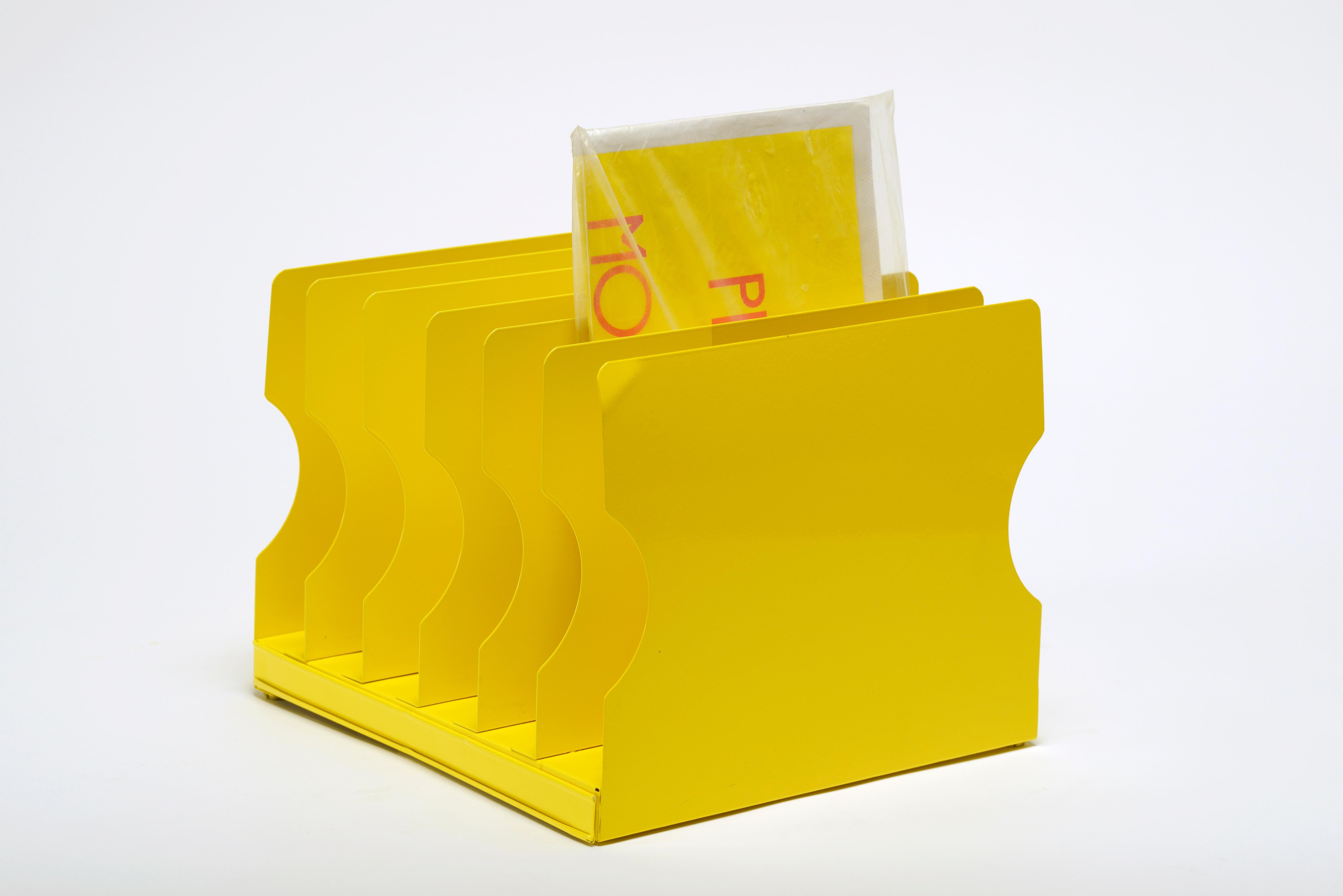 Wonderfully retro desktop file organizer from the 1940s. Vintage steel refinished in Mellow Yellow (YL 01) powder coat. Six slots, perfect for keeping all your important papers in one tidy place. 

This piece is in great refinished vintage