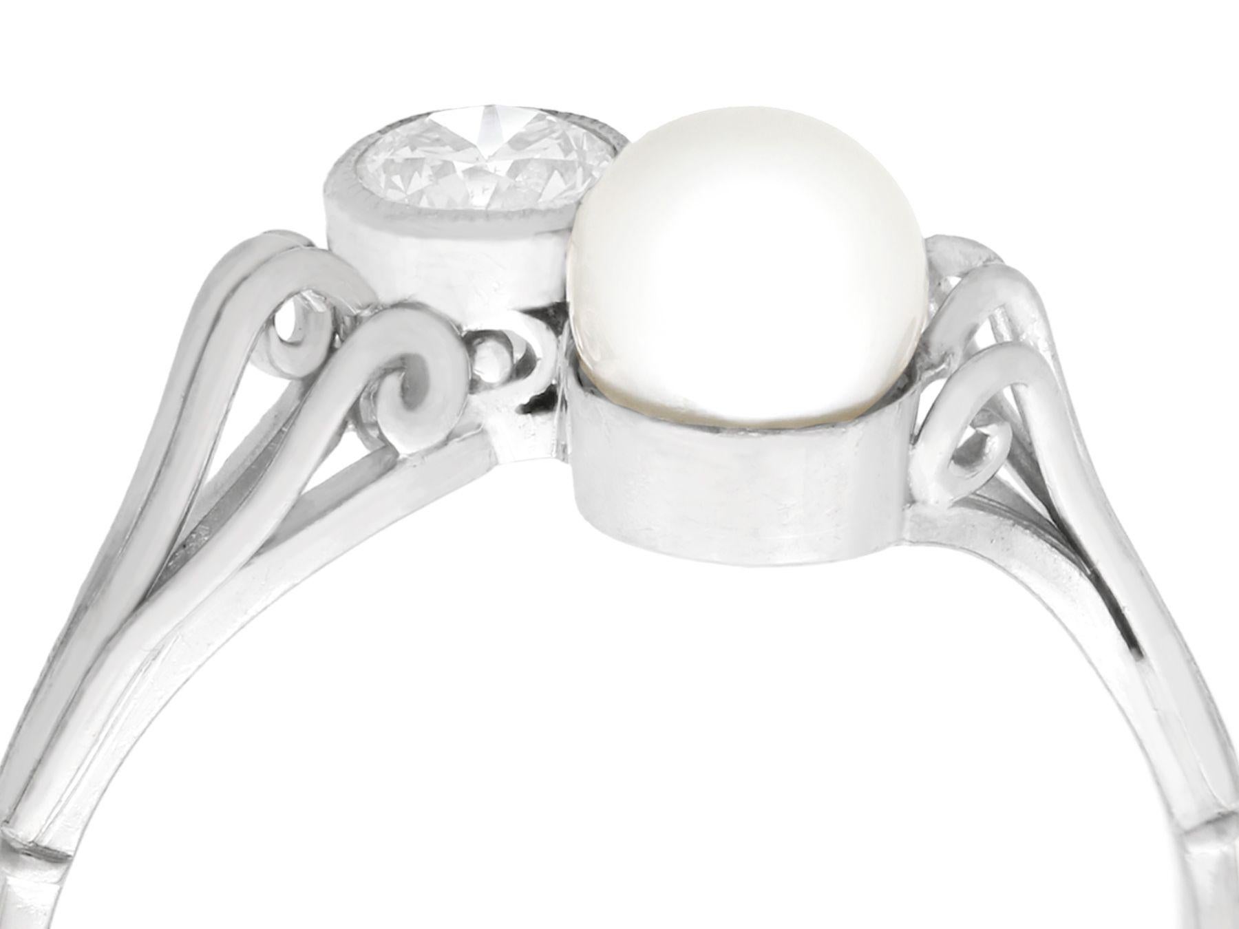 An impressive vintage 0.28 carat diamond and cultured pearl, 14 karat white gold twist style dress ring; part of our diverse pearl jewelry and estate jewelry collections.

This fine and impressive vintage pearl and diamond ring has been crafted in