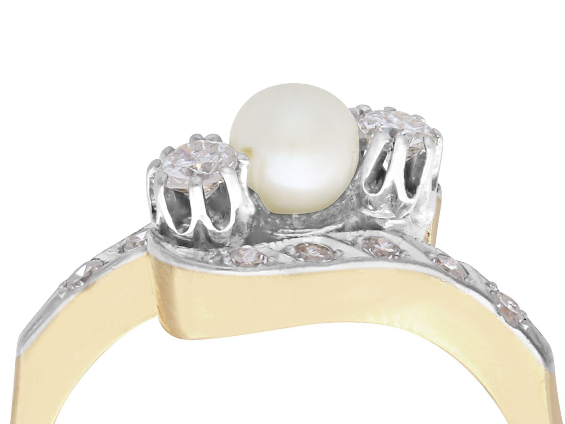 A fine and impressive vintage 0.56 carat diamond and natural pearl, 14 karat yellow gold and 14 karat white gold set cocktail ring; part of our vintage jewelry and estate jewelry collections.

This fine and impressive pearl and diamond twist ring
