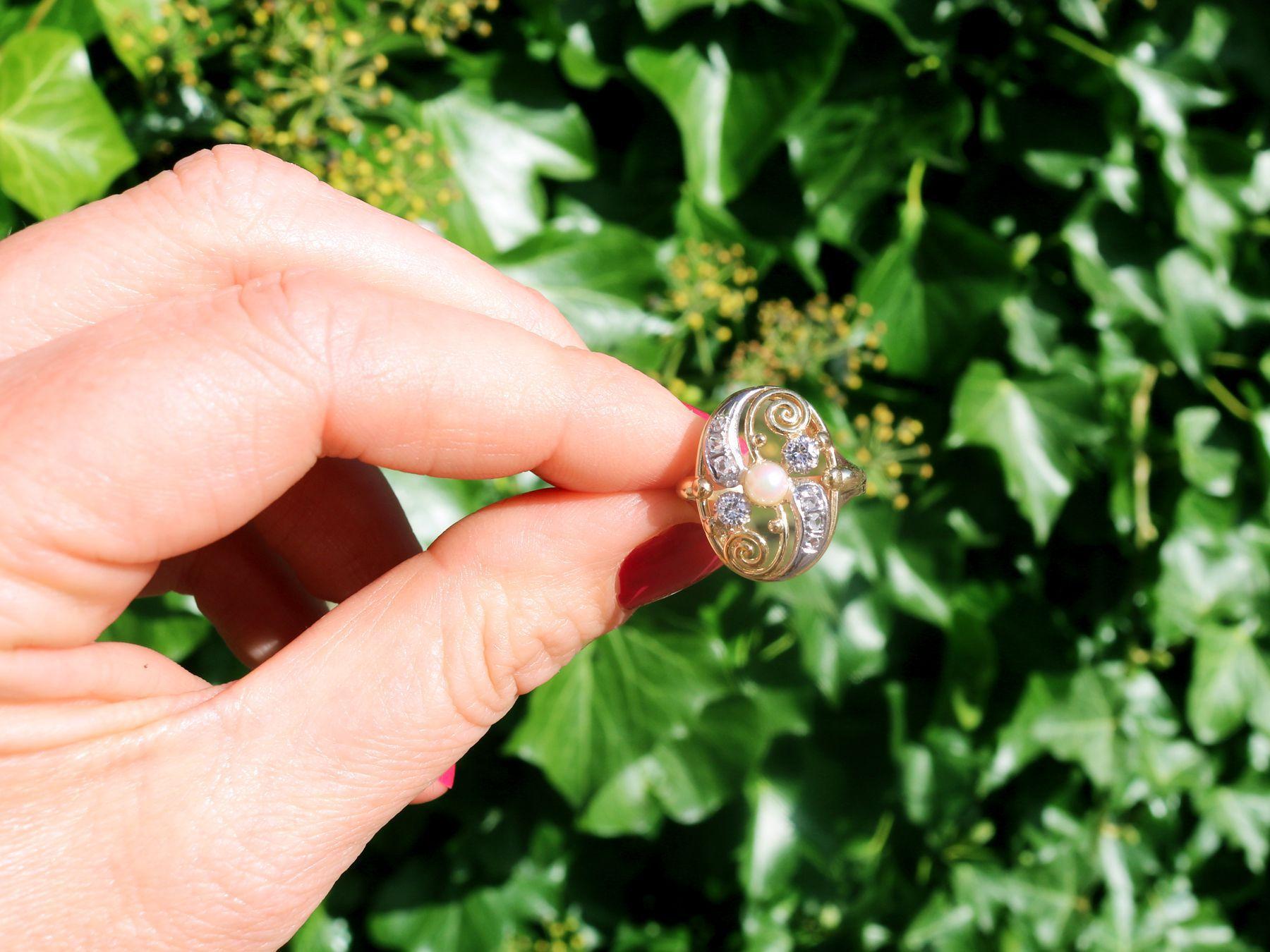 An impressive vintage 0.27 Carat diamond and pearl, 14 karat yellow gold and 14 karat white gold set dress ring; part of our diverse pearl jewelry collections.

This fine and impressive pearl and diamond ring has been crafted in 14k yellow gold with