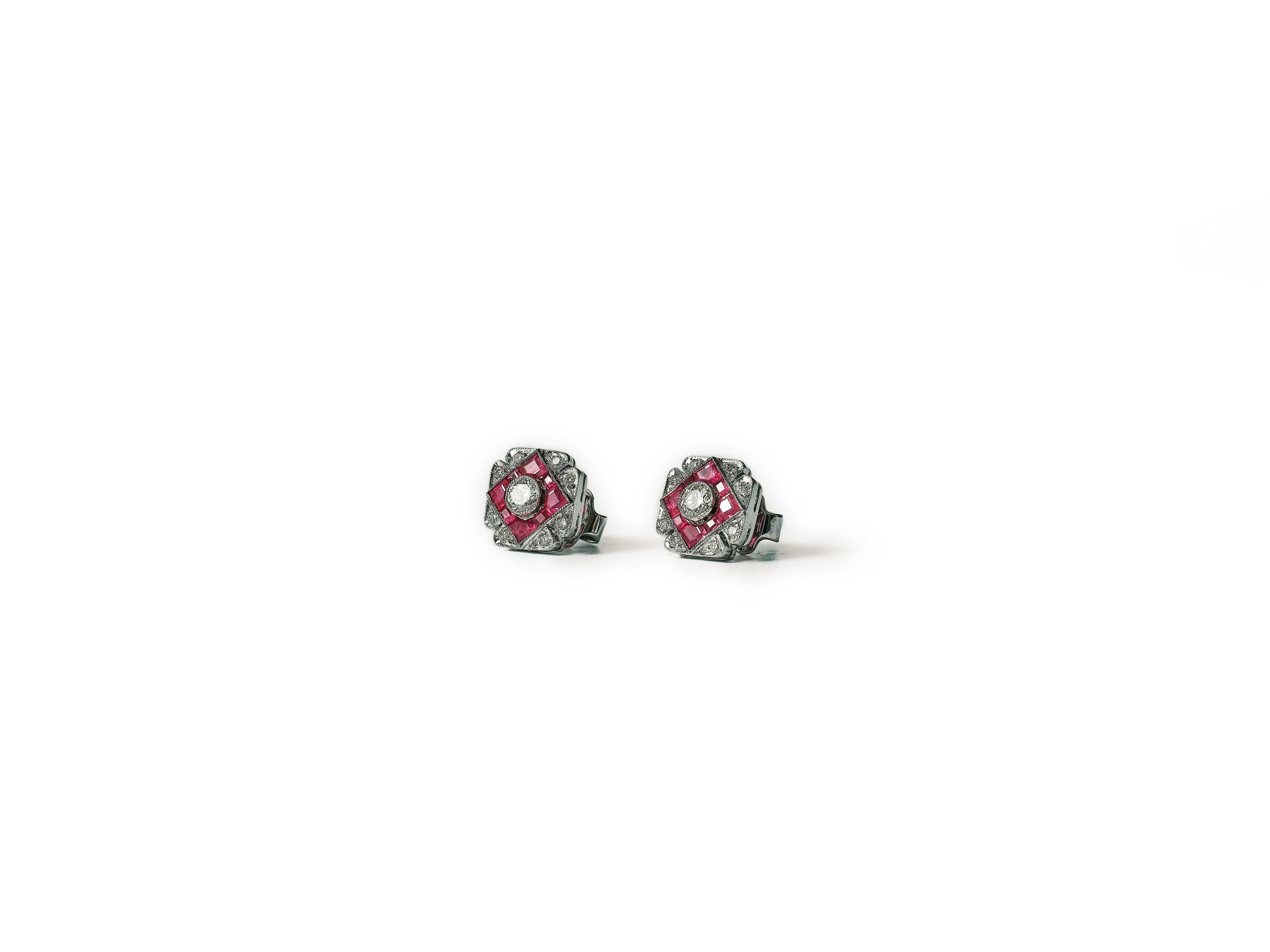 Brilliant Cut 1940s diamond and ruby four-leaf clover earrings. For Sale