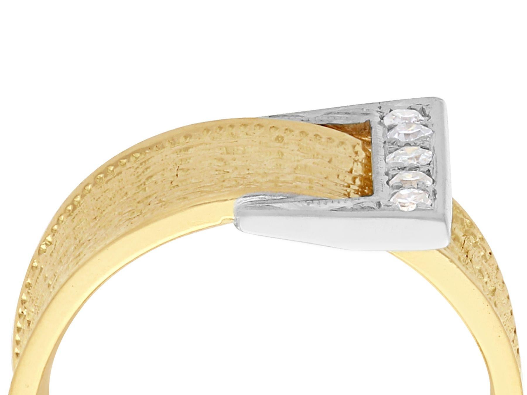 A fine and impressive 0.12 carat diamond and 18 karat yellow gold, 18 karat white gold set dress ring; part of our of vintage jewelry and estate jewelry collections.

This fine and impressive vintage belt and buckle ring has been crafted in 18k