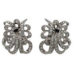 1940's Diamond Platinum Swirl Motif Estate Earclip Earrings