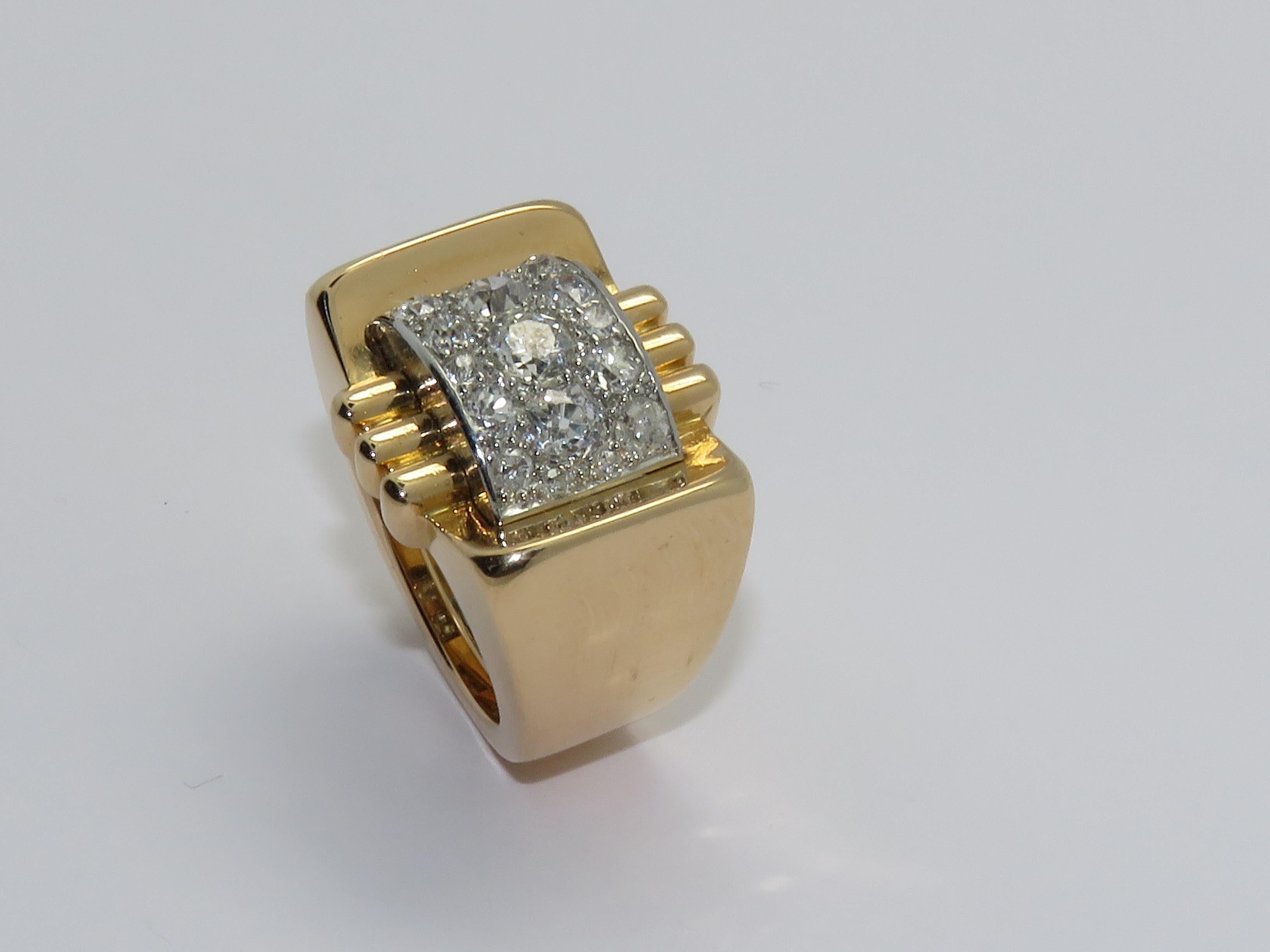 An impressive vintage 1940 1.50 carat diamond and platinum
and 18 Karat yellow gold.
Ring size: 54     6 3/4 Us

Measurements:
Height: 1.06 in ( 2.70 cm )
Length: 0.87 in ( 2.20 cm )
Width: 0.71 in ( 1.80 cm )
Weight: 21.20 grams