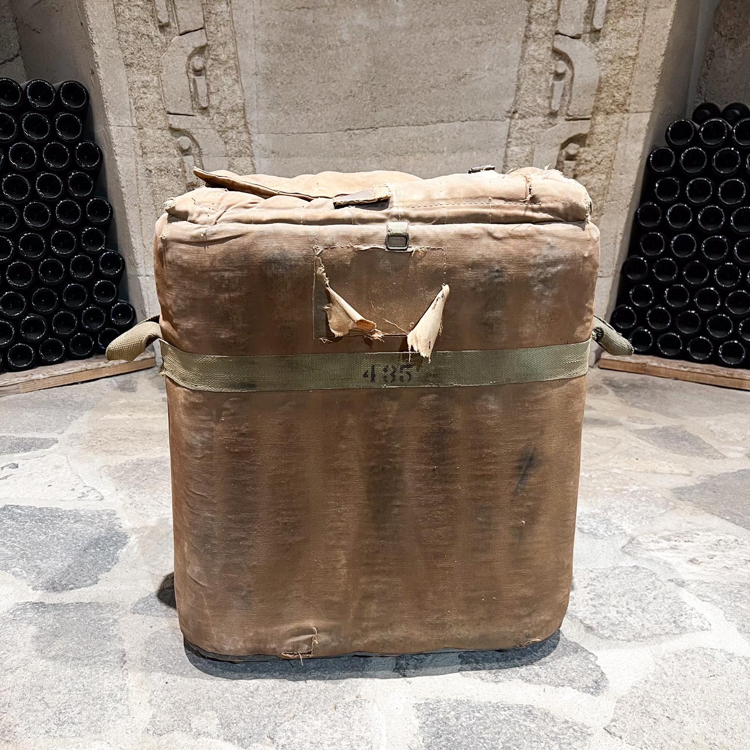 1940s Distressed Military Ice Bucket Portable Insulated Chest
US vintage military surplus ice cooler chest
designed in metal, canvas, cotton and leather 
23 h x 17.75 w x 11.25
Preowned original unrestored vintage distressed condition
Wear