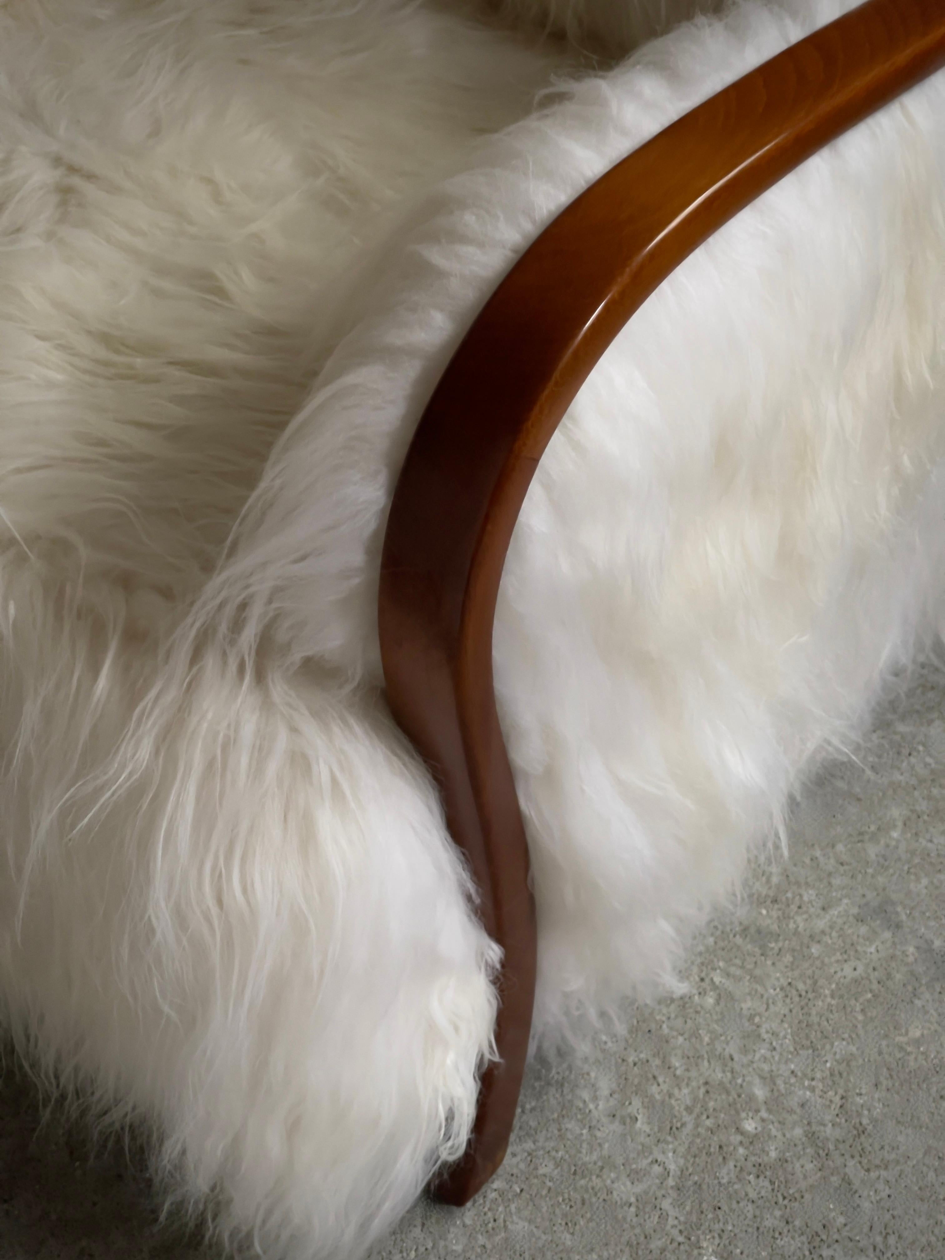1940s Danish Lounge chair reupholstered in long haired Icelandic sheepskin. For Sale 7