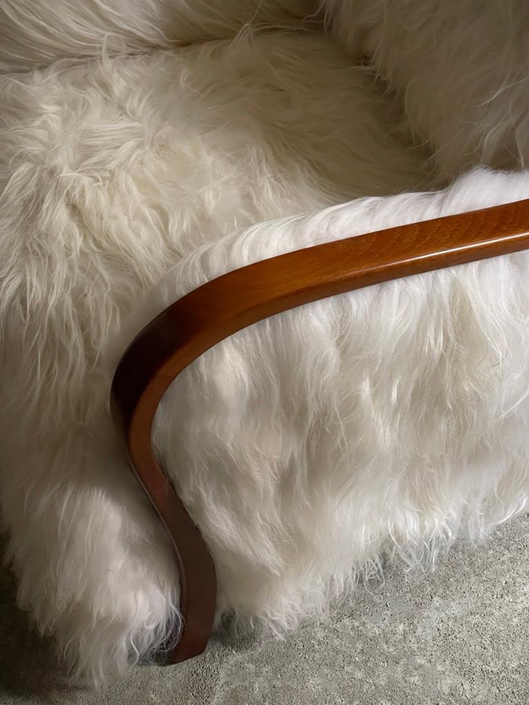 1940s Danish Lounge chair reupholstered in long haired Icelandic sheepskin. For Sale 5