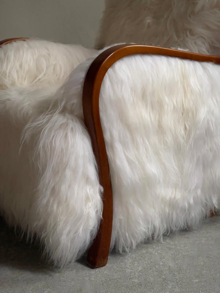 1940s Danish Lounge chair reupholstered in long haired Icelandic sheepskin. For Sale 2