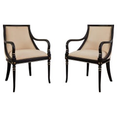 1940's Ebonized Gilt Regency Style Arm Chairs with Custom Cream Upholstery