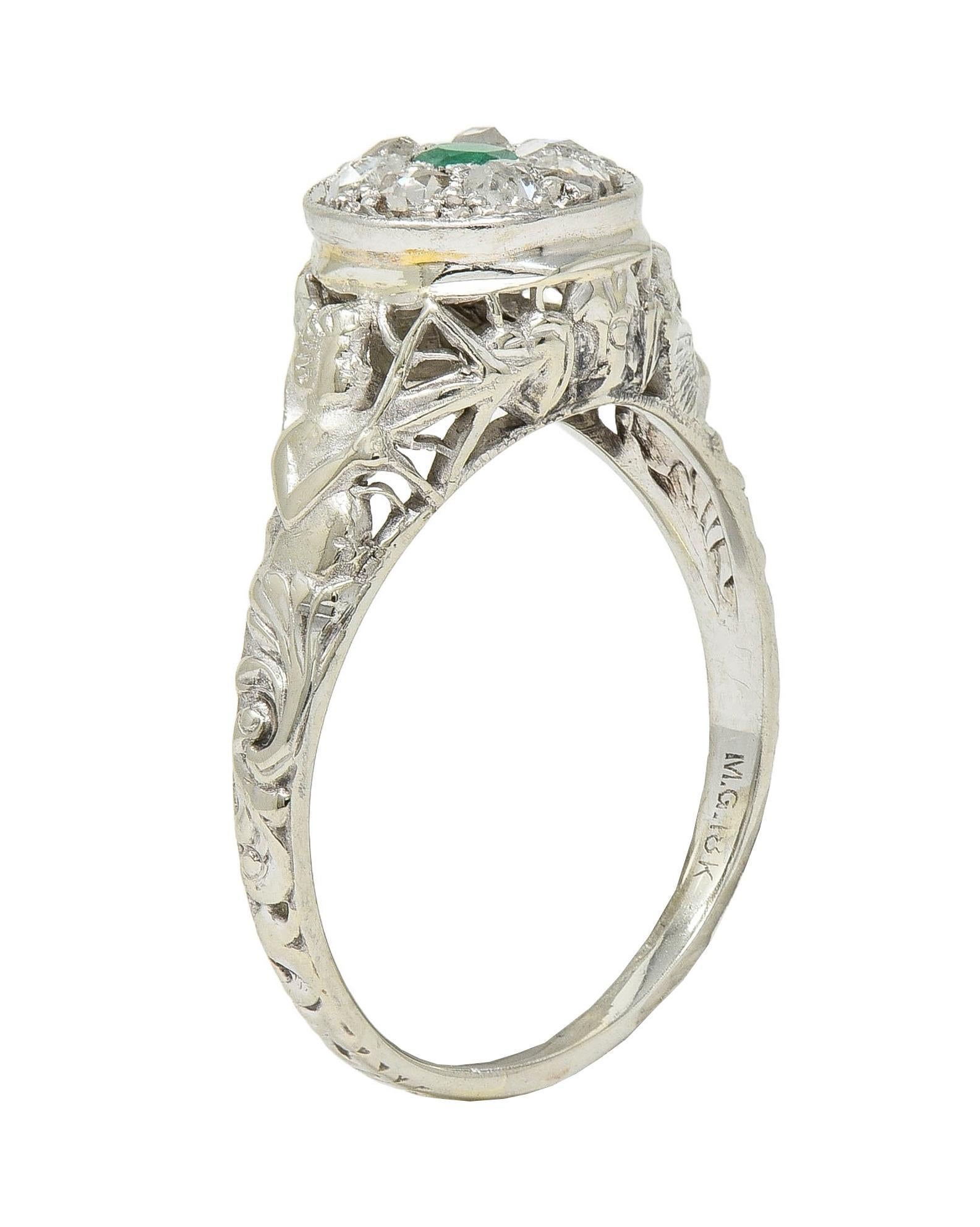 1940's Emerald Diamond 18 Karat White Gold Vintage Cupid Cluster Ring In Excellent Condition In Philadelphia, PA