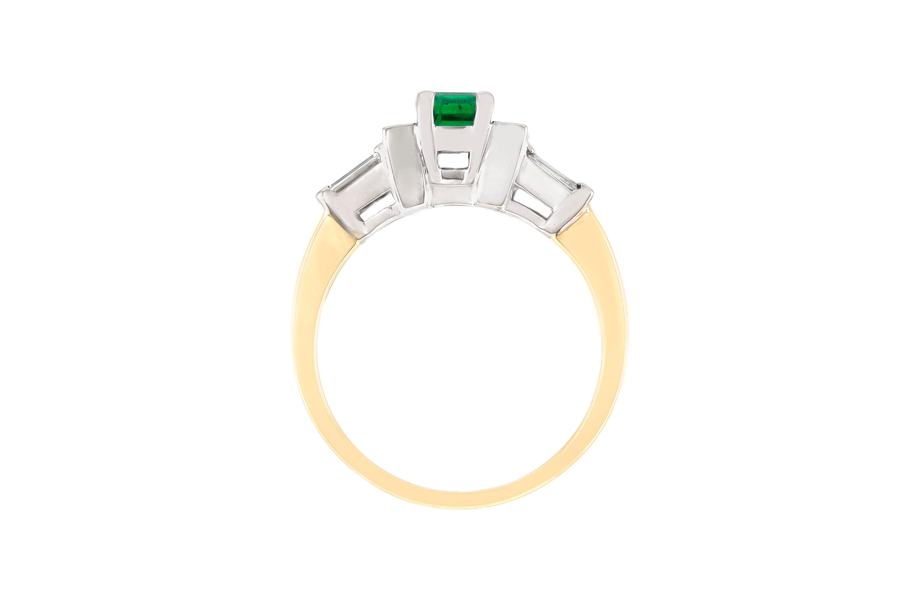 The ring is finely crafted in 18k yellow gold with center emerald weighing approximately total of 0.50 carat and diamonds weighing approximately total of 0.20 carat.
Circa 1940.