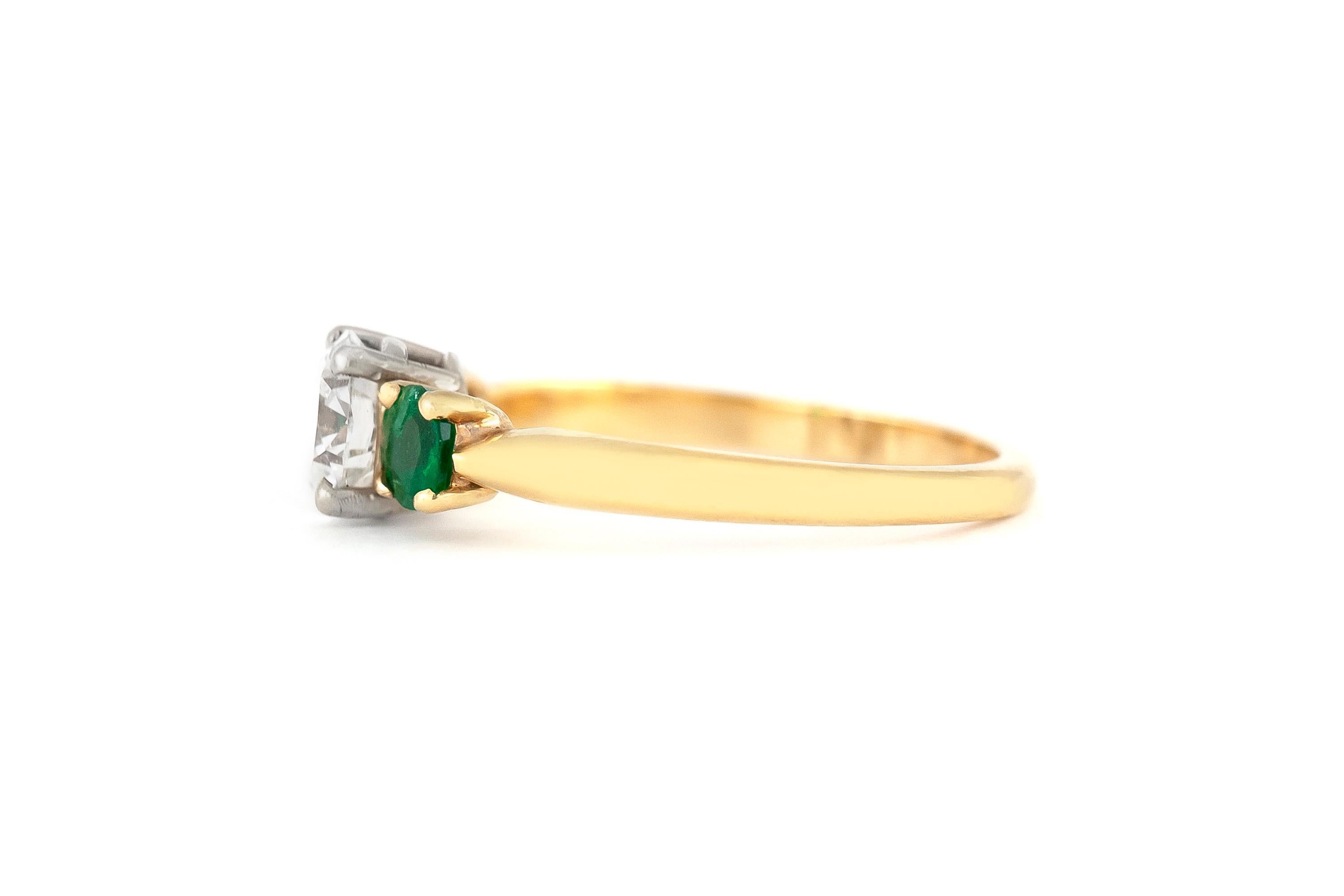 The ring is finely crafted in 14 k yellow gold with center diamond weighing approximately total of 0.74 carat and with two side emerald stone weighing approximatey total of 0.50 carat.
Circa 1940.