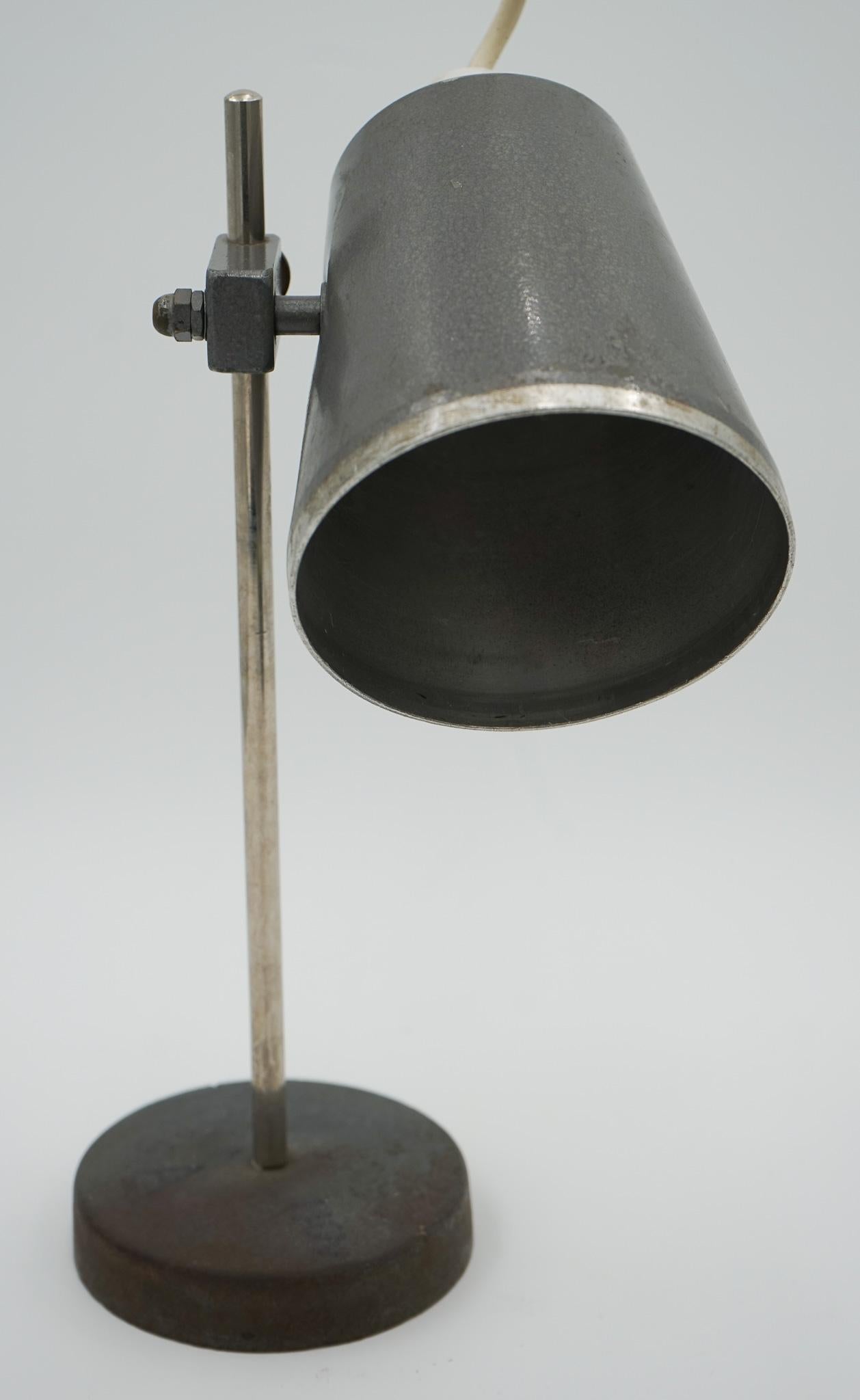 We are delighted to offer for sale this 1940s English Salvaged Laboratory School Lamp Is A Remarkable Piece.

 This lamp showcases the charm and industrial design of its era. The lamp features a natural patina that tells a story of its past, with