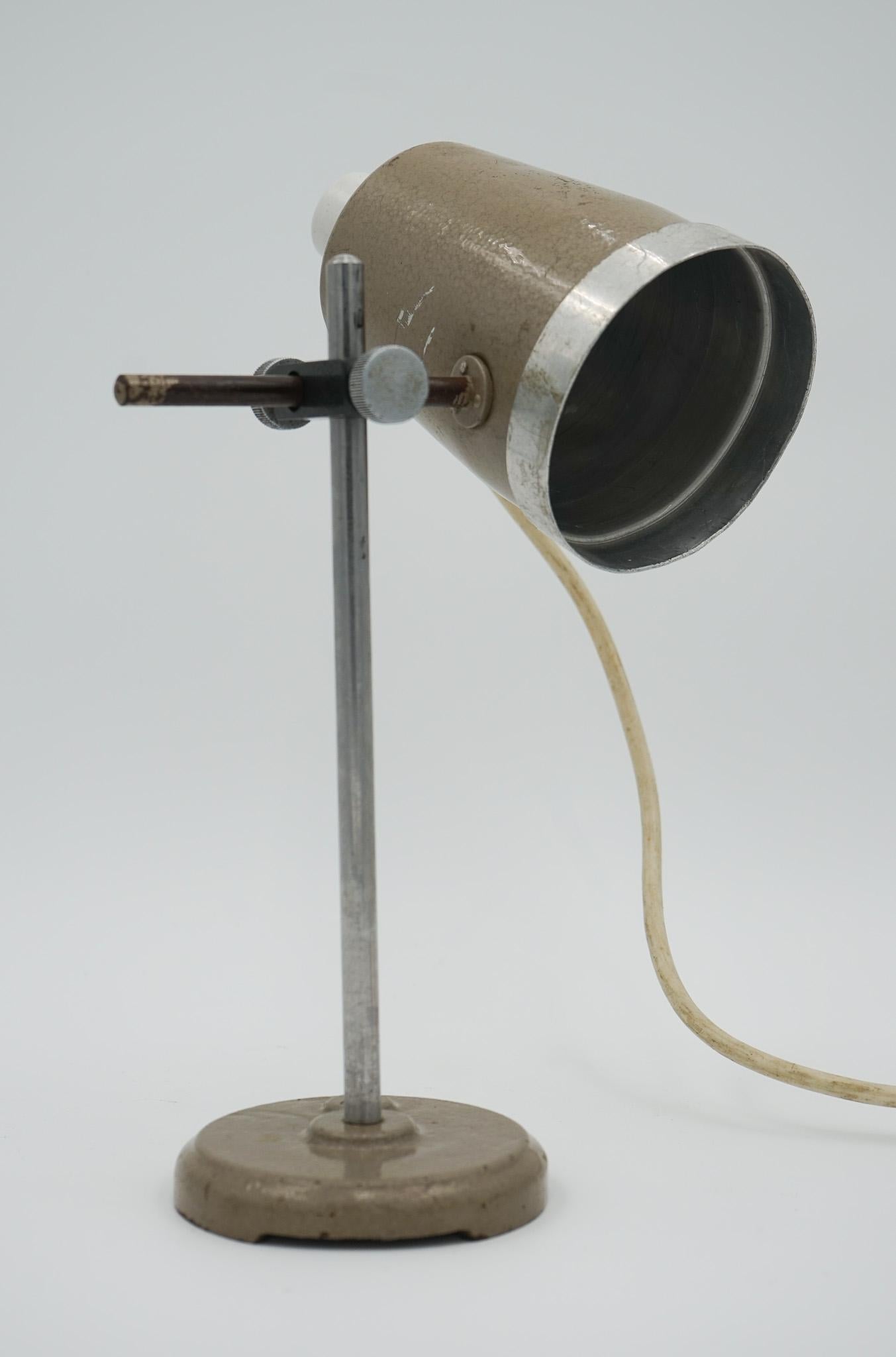 We are delighted to offer for sale this 1940s English Salvaged Laboratory School Lamp Is A Remarkable Piece.

 This lamp showcases the charm and industrial design of its era. The lamp features a natural patina that tells a story of its past, with