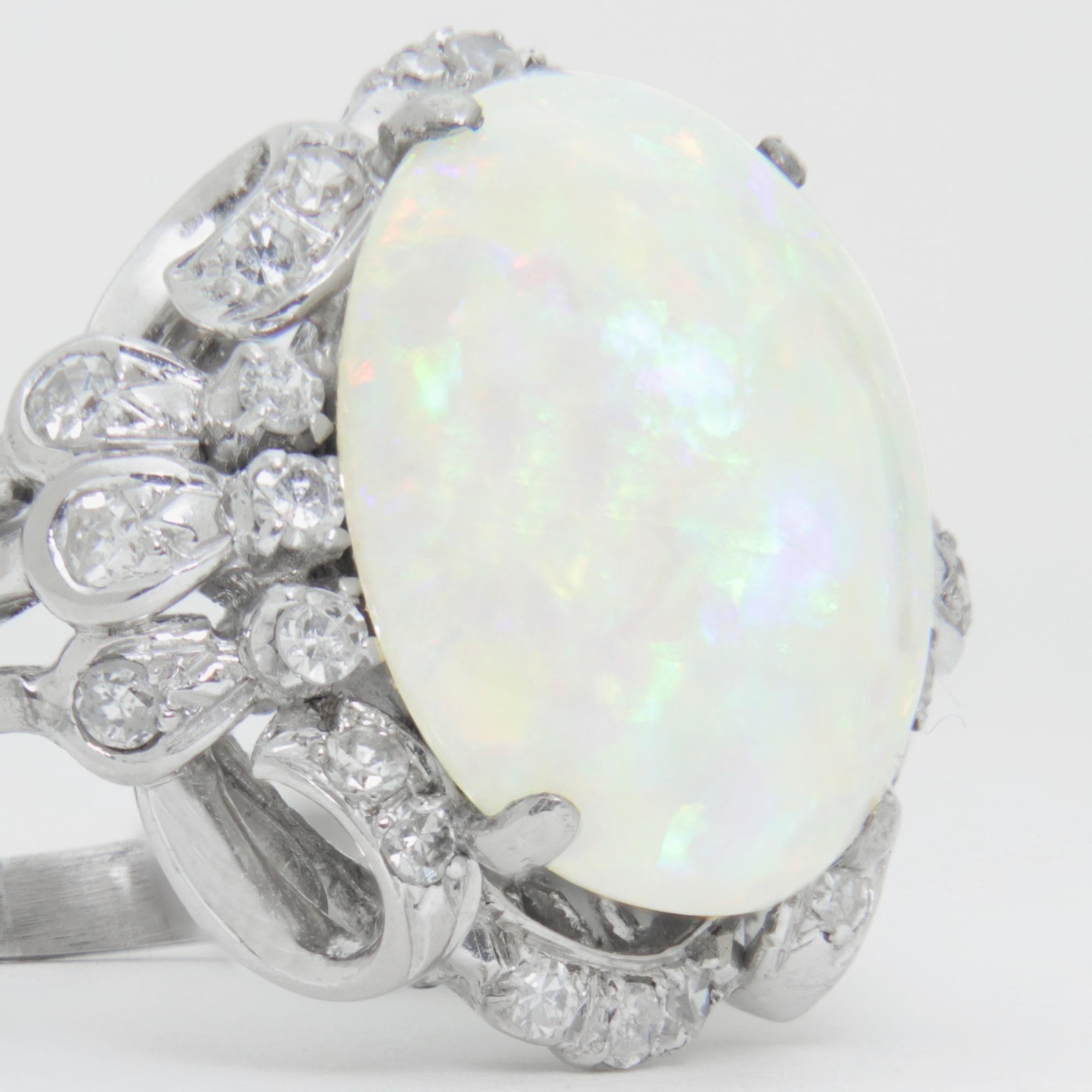 1940s Era, 18 Karat White Gold, Cabochon Opal, and Diamond Ring In Good Condition In Brisbane, QLD