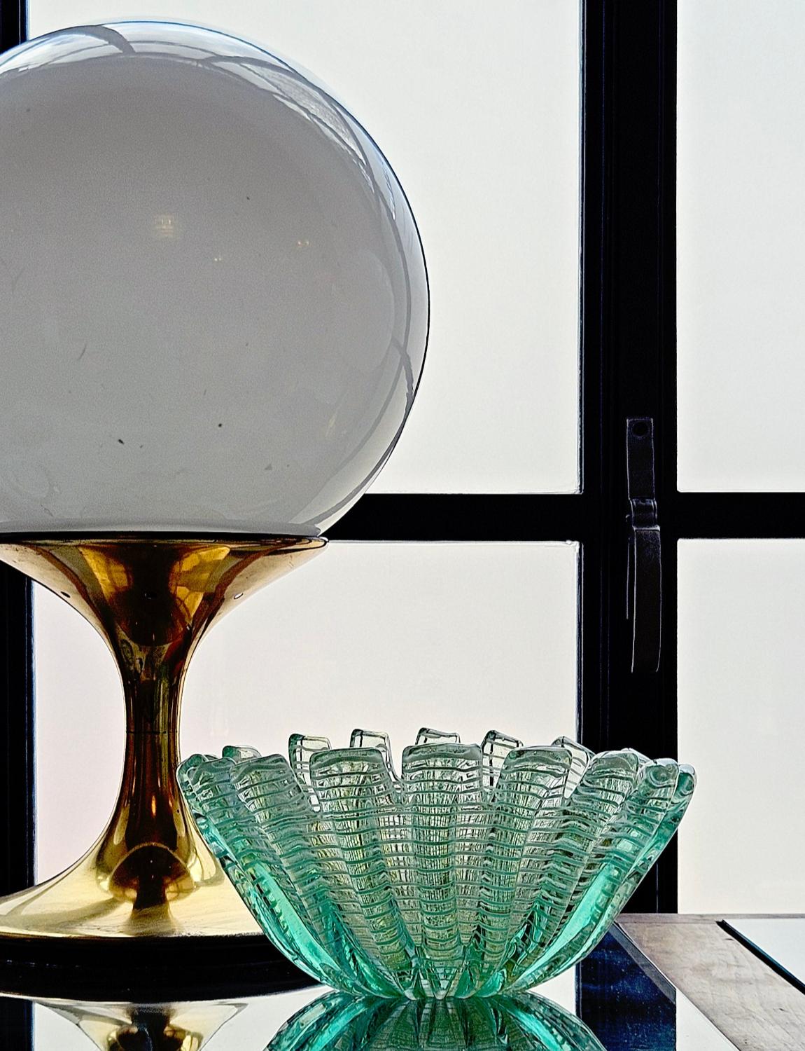 An extraordinary example of an Ercole Barovier pale green turquoise murano glass bowl with concentric gold zebratta stripes throughout. This hand-blown zebratta bowl is a rare pale turquoise colour with turreted edges. A true collector's piece.