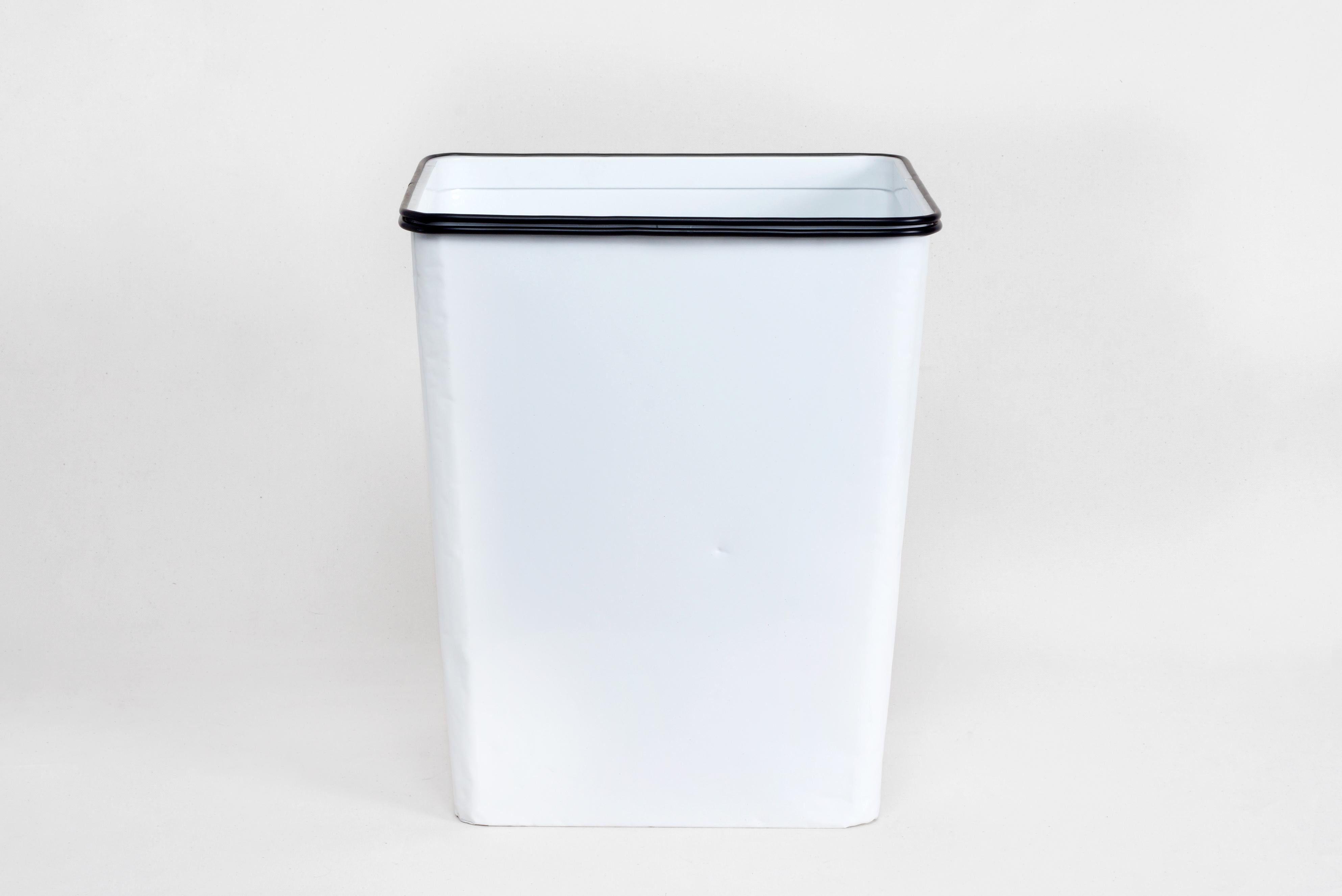 Excellent 1940s steel trash can refinished with a gloss white powder coat. Stamped: ERIE ART METAL, DAN-DEE No. 8, ERIE, PA USA. Tapered rectangular shape with rubber trim. Ideal addition for your office, bathroom or kitchen. Please note gentle