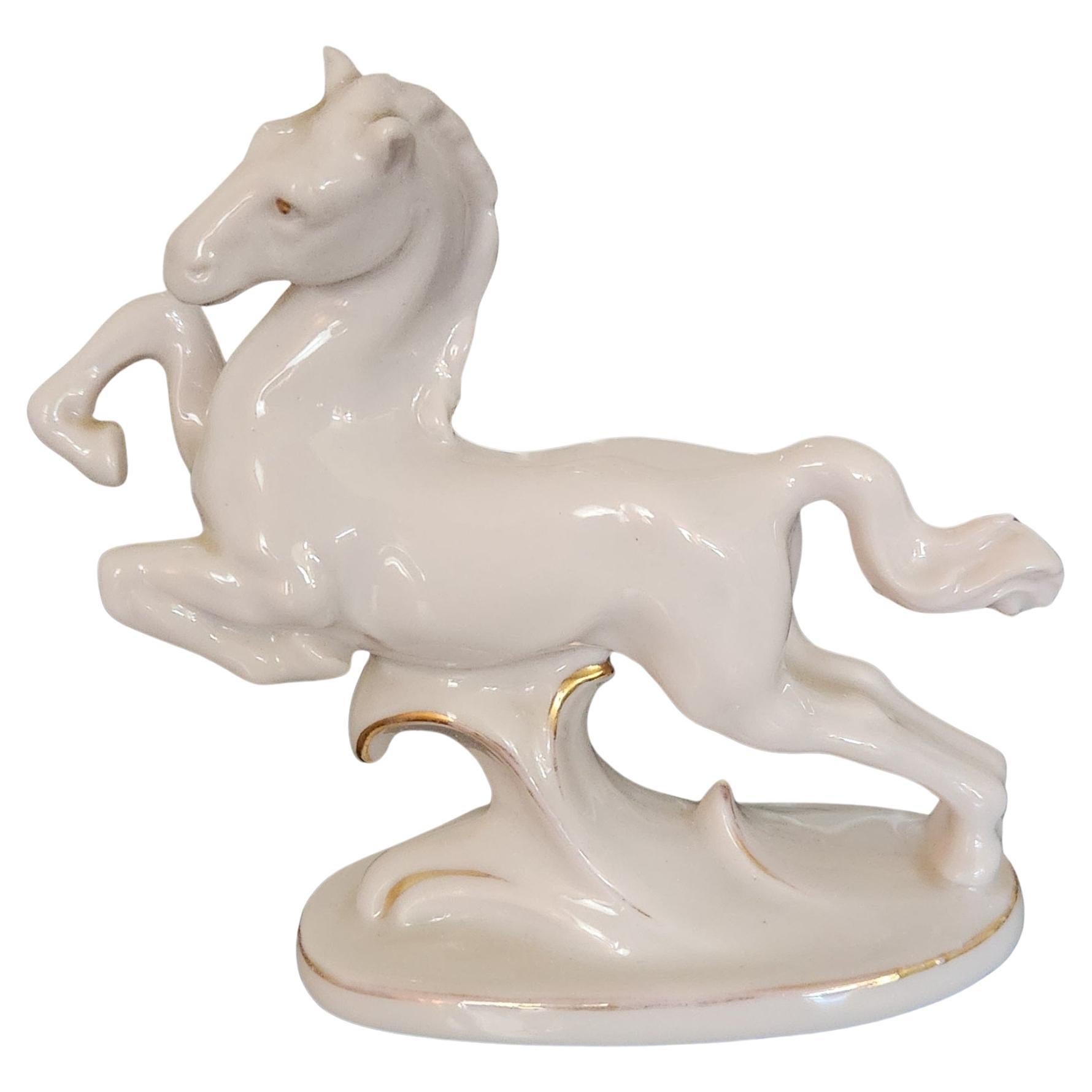 1886 established Erphila Germany White Porcelain & Gold Trim Horse Figurine
handcrafted Germany stamped by maker
4.25t x 2 w x 5 d
Preowned vintage condition
Refer to images