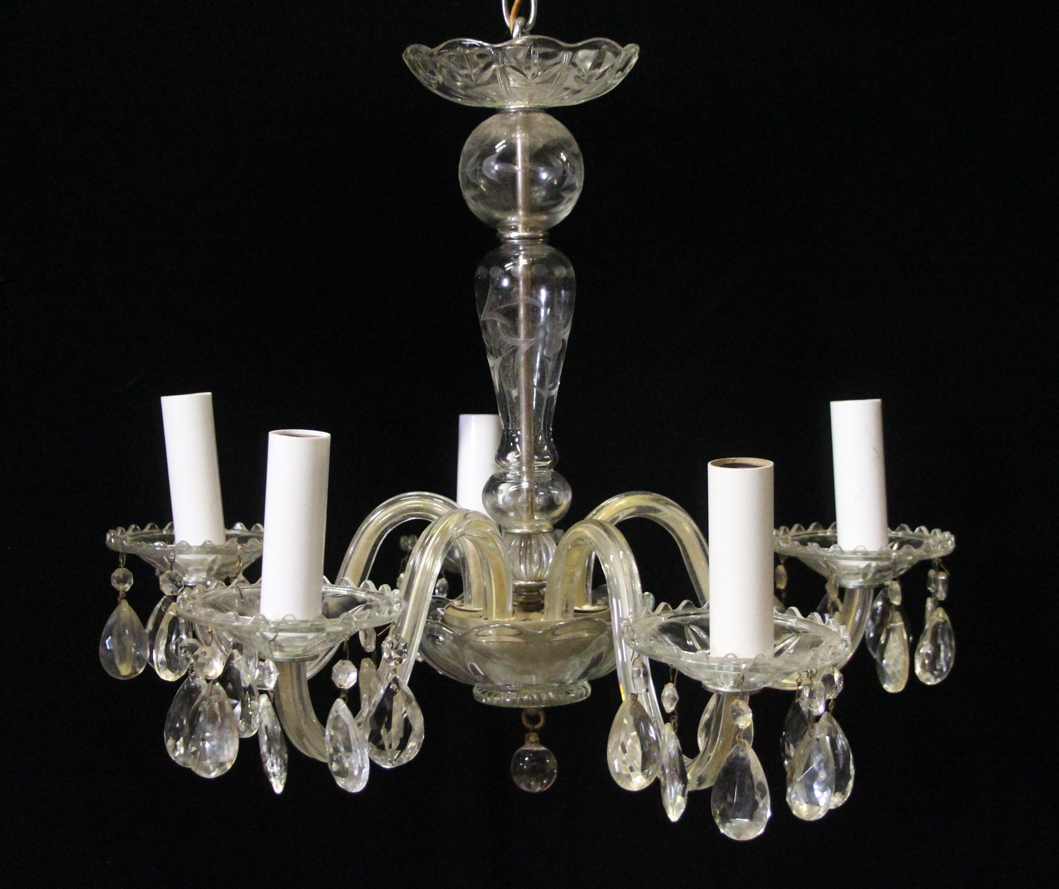 Five light crystal chandelier with etched glass and pressed bobeches. This 1940's light has clear glass and tear drop crystals. Price includes restoration. This can be seen at our 400 Gilligan St location in Scranton, PA.