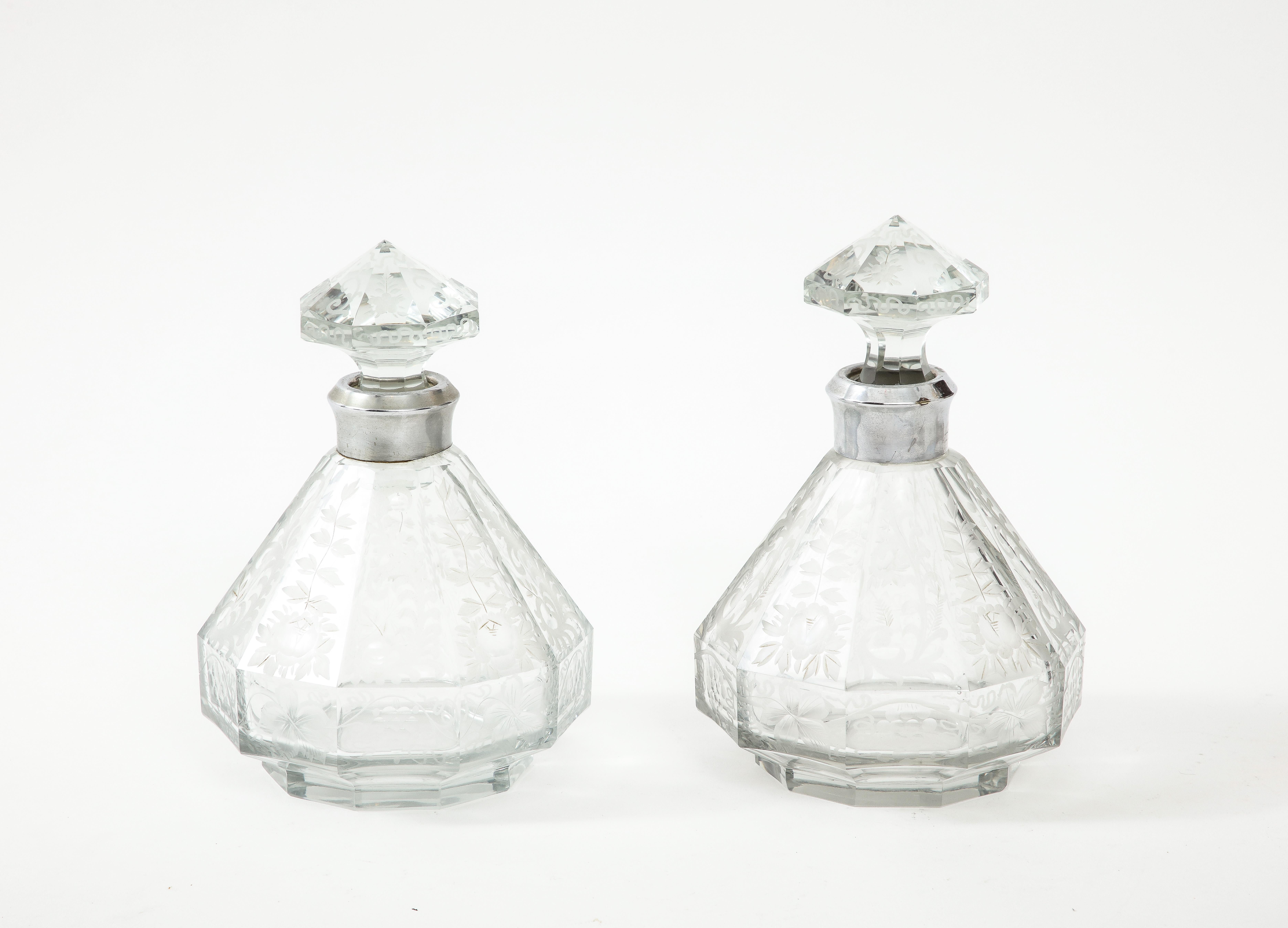 1940's etched glass decanters with stoppers, in vintage original condition with minor wear and patina due to age and use.