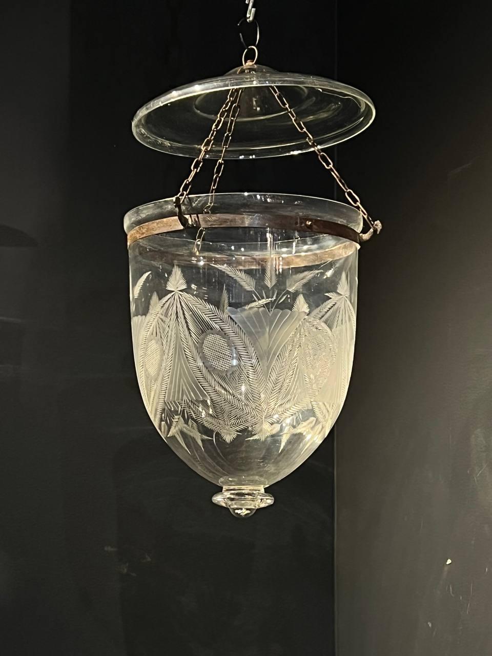 A circa 1940's glass lantern with leaves design and three interiors lights