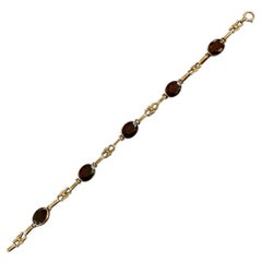 1940s Faceted Garnet 14 Karat Yellow Gold Bracelet