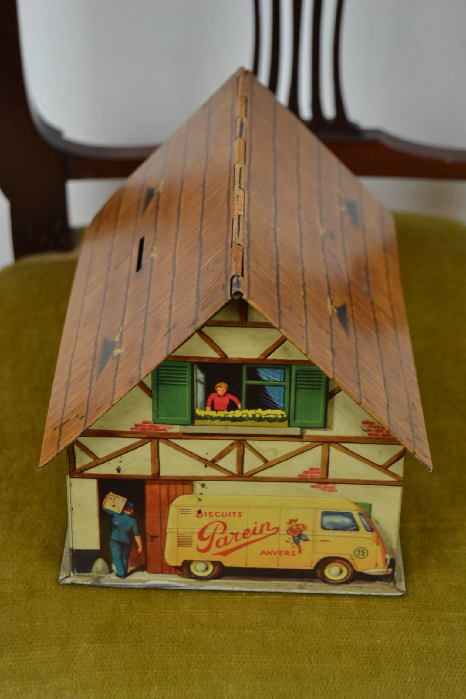 Farmhouse biscuit tin - house biscuit tin with VW bus. 
A late 1940s biscuit tin made for the Belgian Biscuit Company Parein.
The Parein Biscuit Company was located in Antwerp.
This litho biscuit tin storage box was designed by L.Ruymen; his