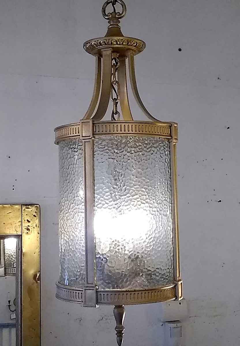 Federal bronze pendant lantern with clear pebbled glass. From the 1940s. Small quantity available at time of posting. Please inquire. Priced each. Please note, this item is located in our Scranton, PA location.