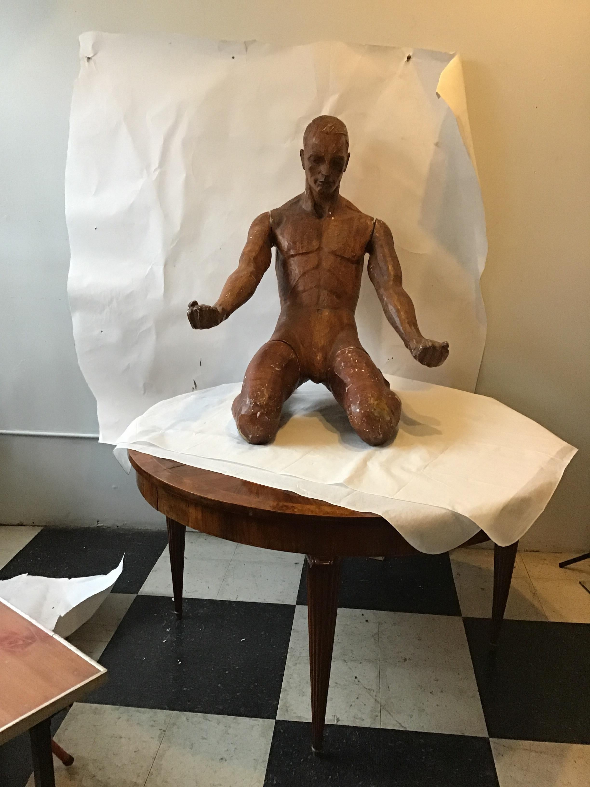 1940s fiberglass life-size male mannequin. Was used to model bathing suits. Mannequin can be disassembled.