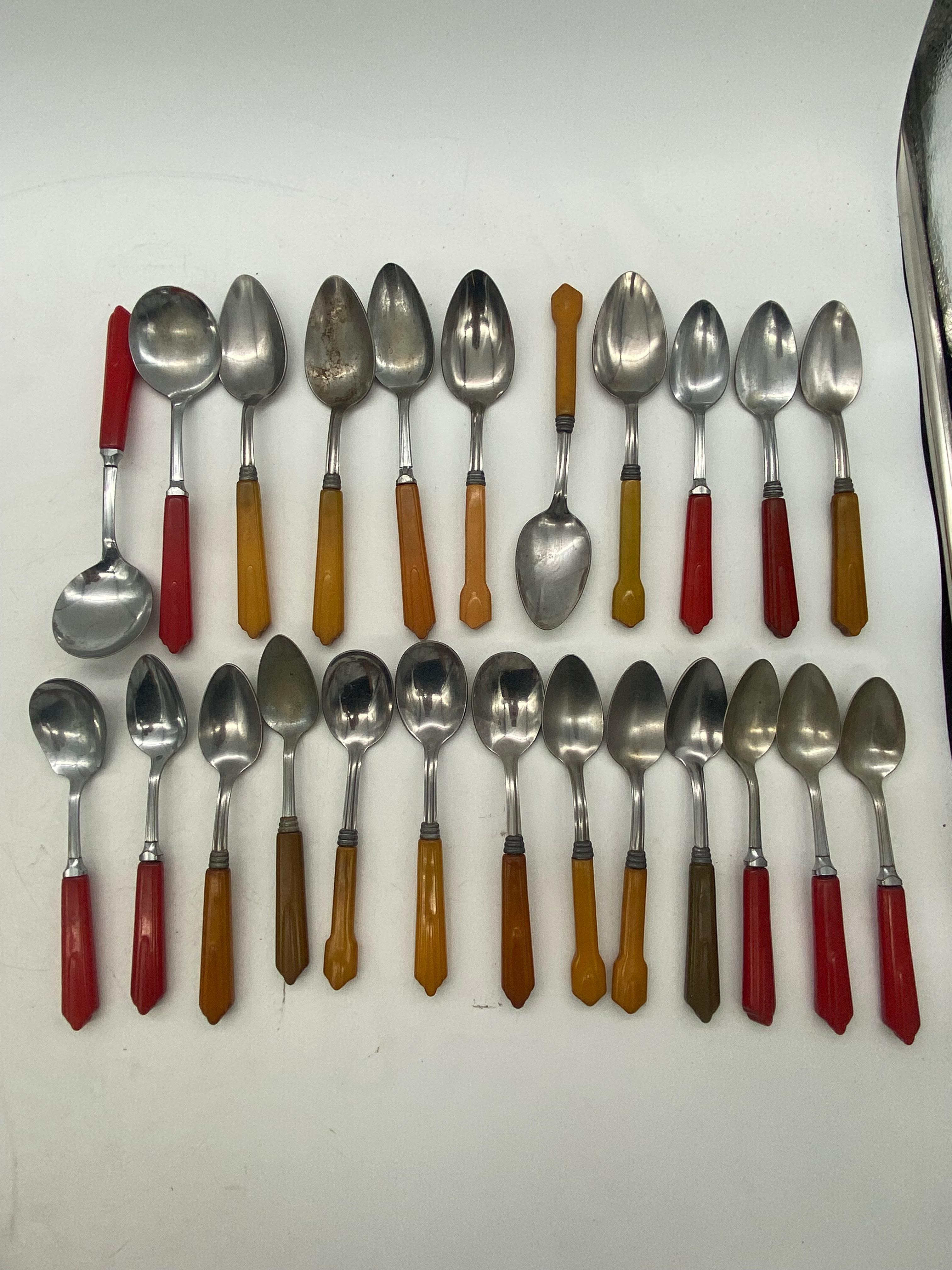 Extremely rare and large collection of bakelite, ver rare set of fiesta bakelite stainless steel varieties that range from red, brown, butterscotch, yellow green and even some rare black bakelite. Inspired by the influence of art deco we have two