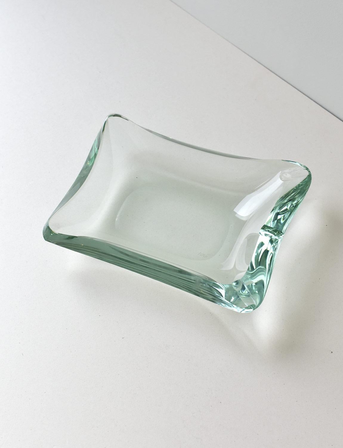 A very large 1940s pale green glass rectangular bowl which can be used as a 'tasca vuota' (empty pocket) or ashtray. The piece is signed on the base as per the photo. This very heavy handsome piece is on excellent condition, perfect for any coffee