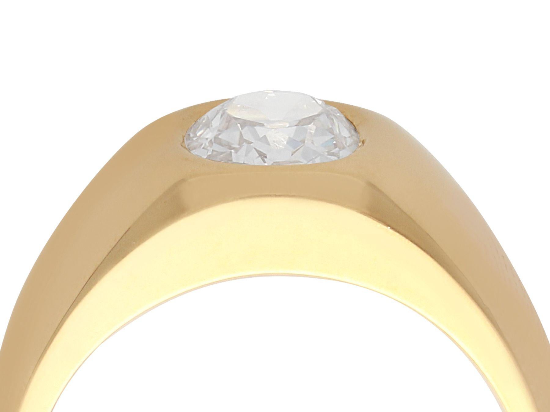 A stunning, fine and impressive vintage French 1.04 carat diamond and 18k yellow gold gent's solitaire ring; part of our diverse contemporary jewelry collections.

This stunning, fine and impressive French gent's solitaire ring has been crafted in