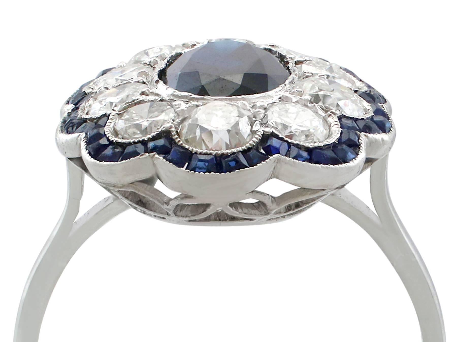 A stunning, fine and impressive vintage French 1.66 carat blue sapphire and 1.60 carat diamond, platinum cluster ring; part of our diverse gemstone jewelry collection

This stunning, fine and impressive vintage French sapphire and diamond cluster