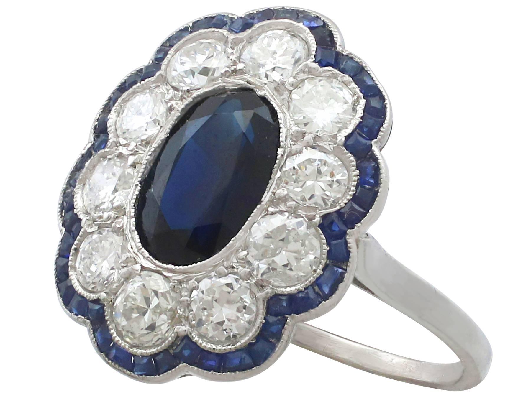 Round Cut 1940s French 1.66 Carat Sapphire and 1.60 Carat Diamond Platinum Cluster Ring