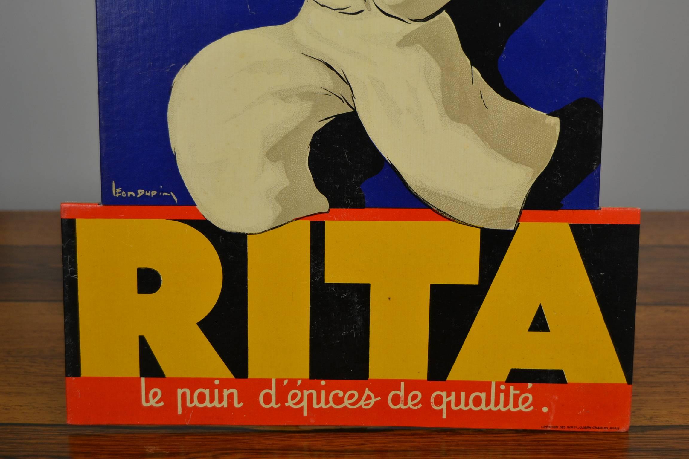 Original vintage 3D Lithographic Cardboard Publicity Sign for Waffle Bakery Rita – Roubaix, France, 1940-1945.
Good press and colors by Imprimerie Joseph-Charles, Paris, France.
Création Dessin Publicitaire - signed by Artist / Designer Leon