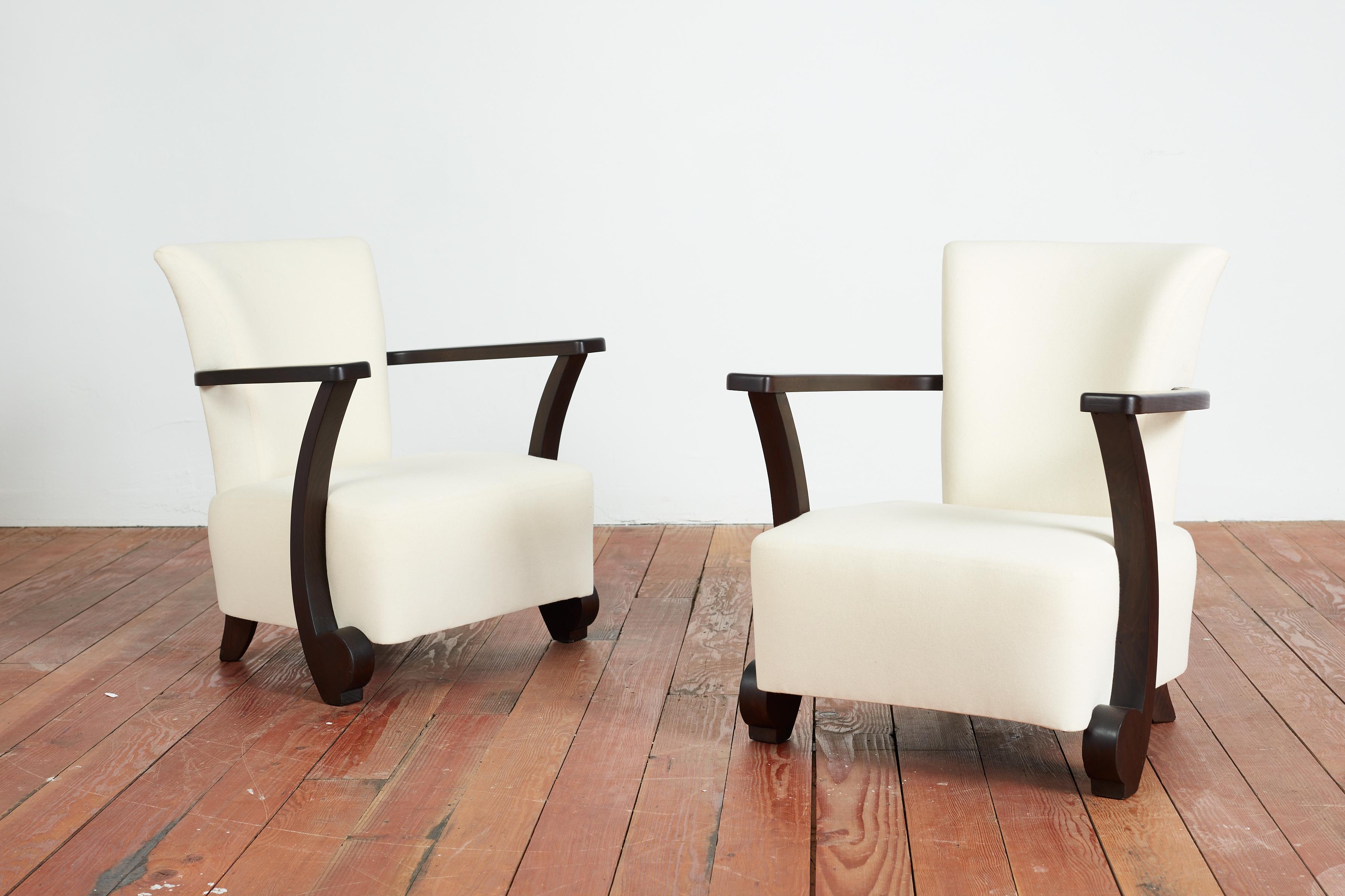 Pair of French Art Deco Chairs with ebony wood frame and upholstered in white muslin fabric - 
Petite in scale with interesting curves and shape 
France, 1940s