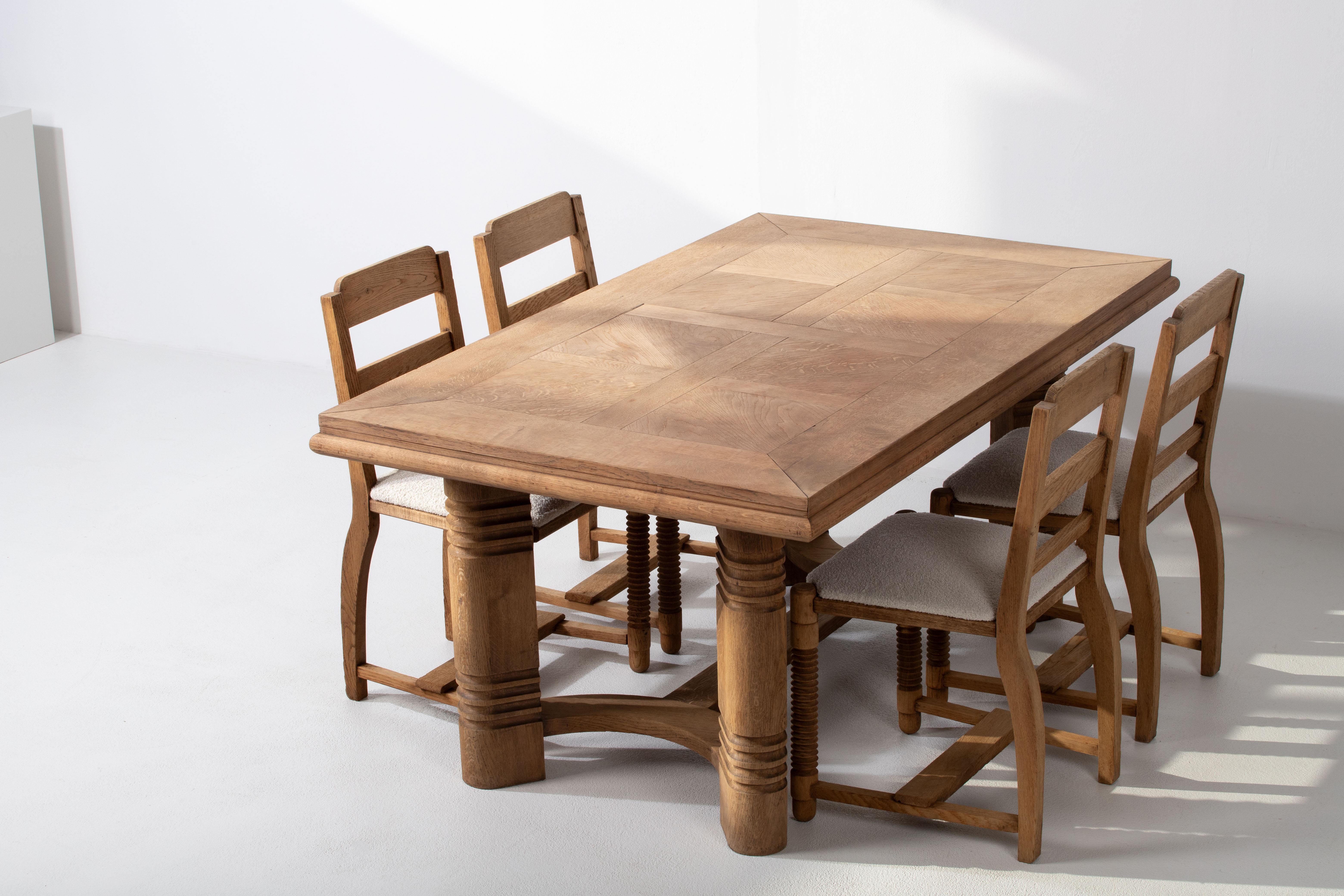 Introducing a Stunning French Art Deco Dining Table in Oak

Step into the world of timeless design with our French Art Deco dining table. This piece pays homage to the renowned Charles Dudouyt, a master craftsman celebrated for his impeccable work