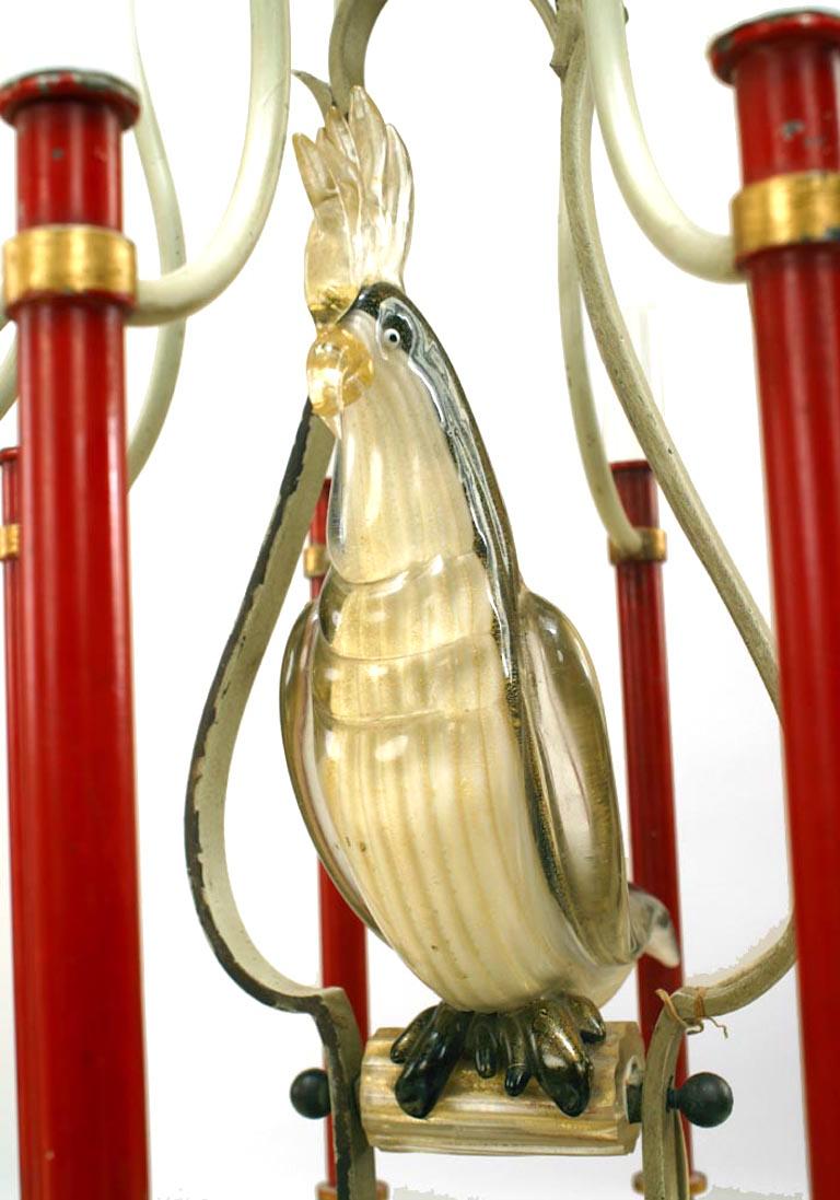 French mid-century (1940s) red and white painted metal 10 arm chandelier with Murano glass bird in center with canopy. (Attributed to BAGUES).
 