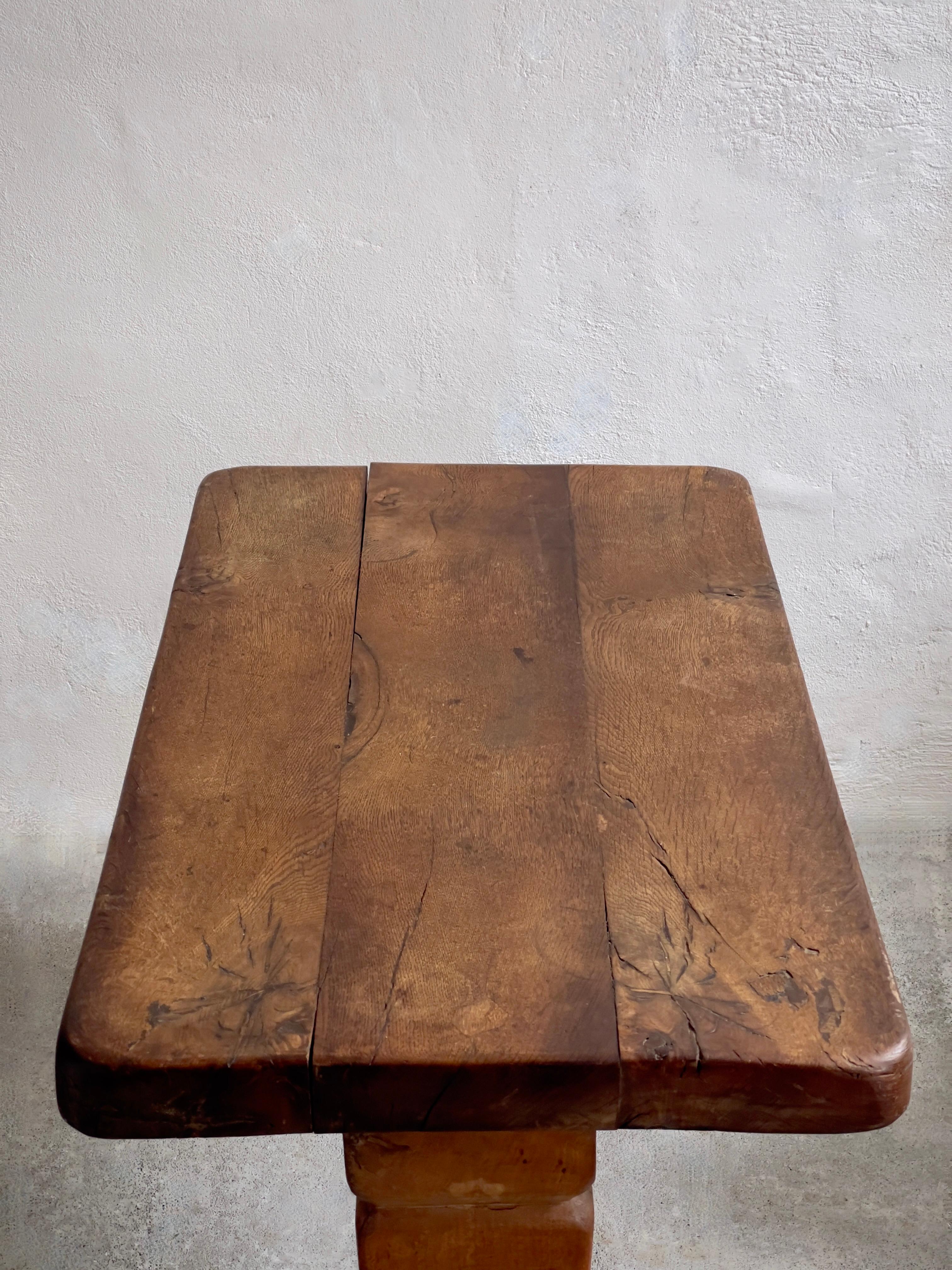 Hand-Crafted 1940s French Brutalist side table in solid patinated oak.  For Sale