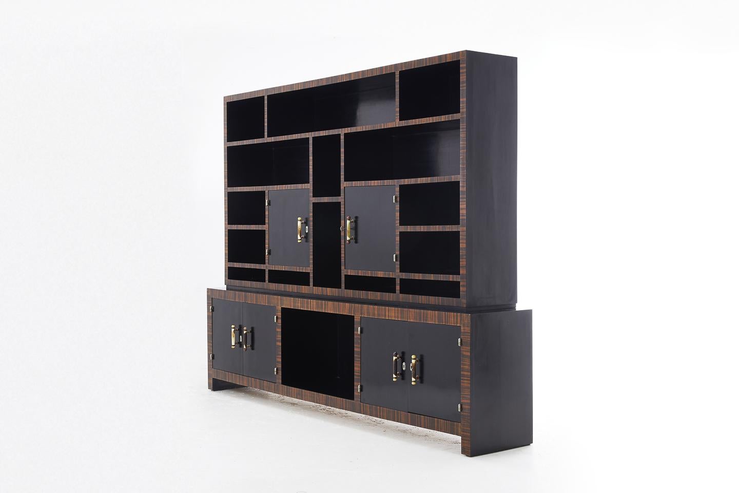 Well proportioned 1940s ebonised French cabinet with Macassar ebony edge banding.