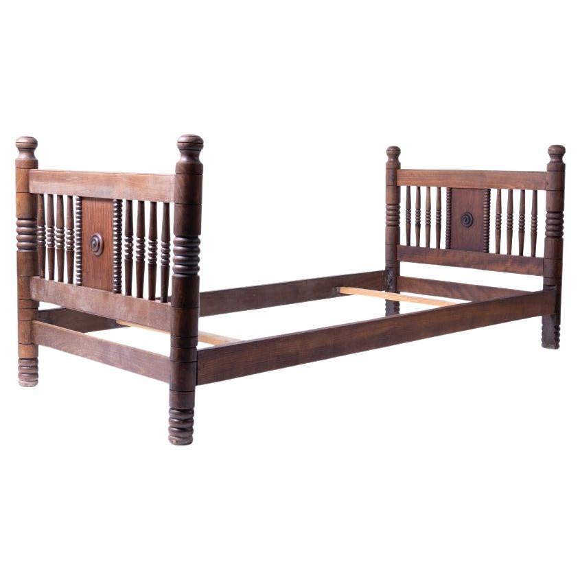 1940's French Carved Wood Bed by Charles Dudouyt For Sale