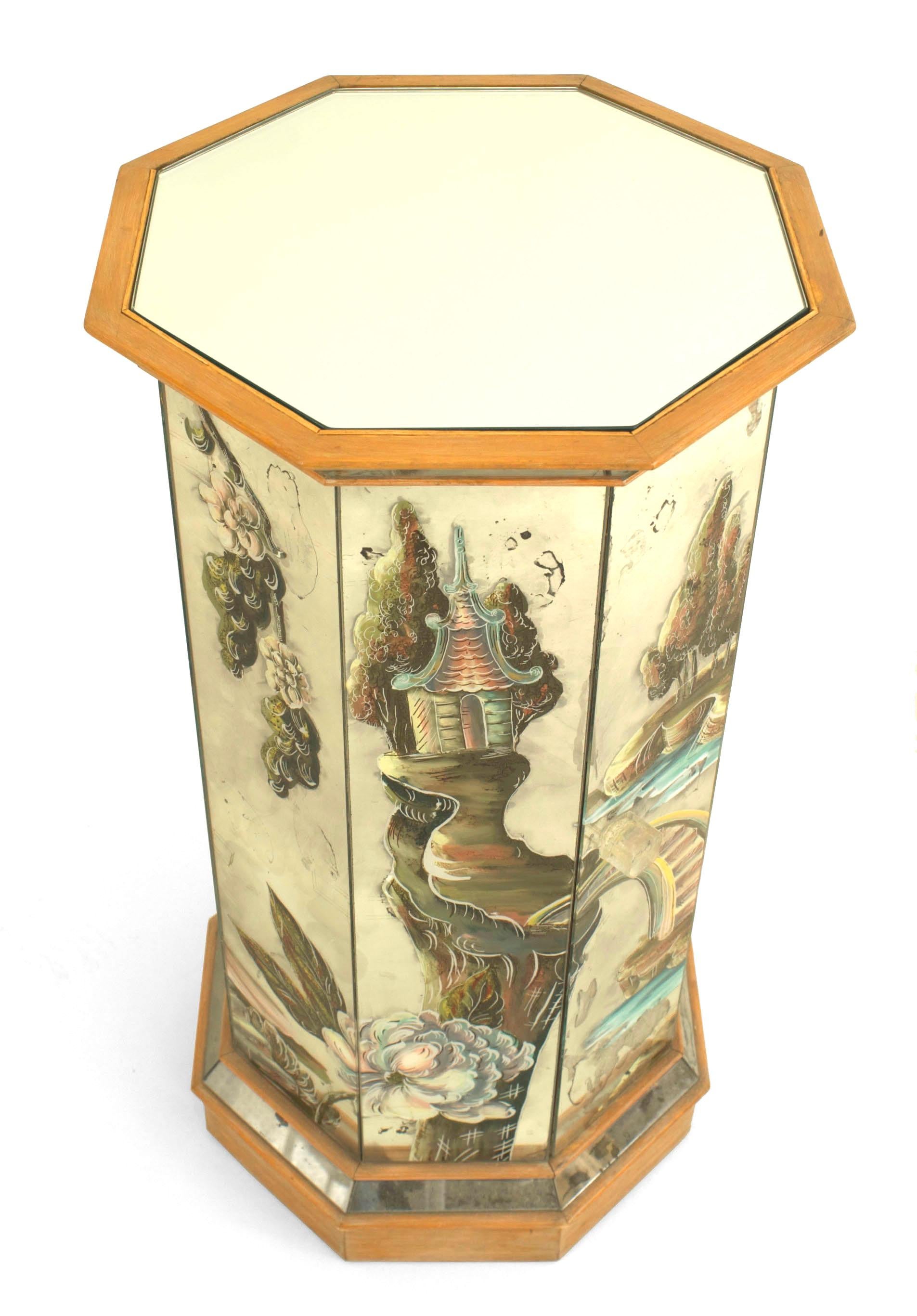 1940's French octagonal shaped pedestal with storage concealed behind a door. The mirrored glass exterior is decorated in painted Chinoiserie designs.