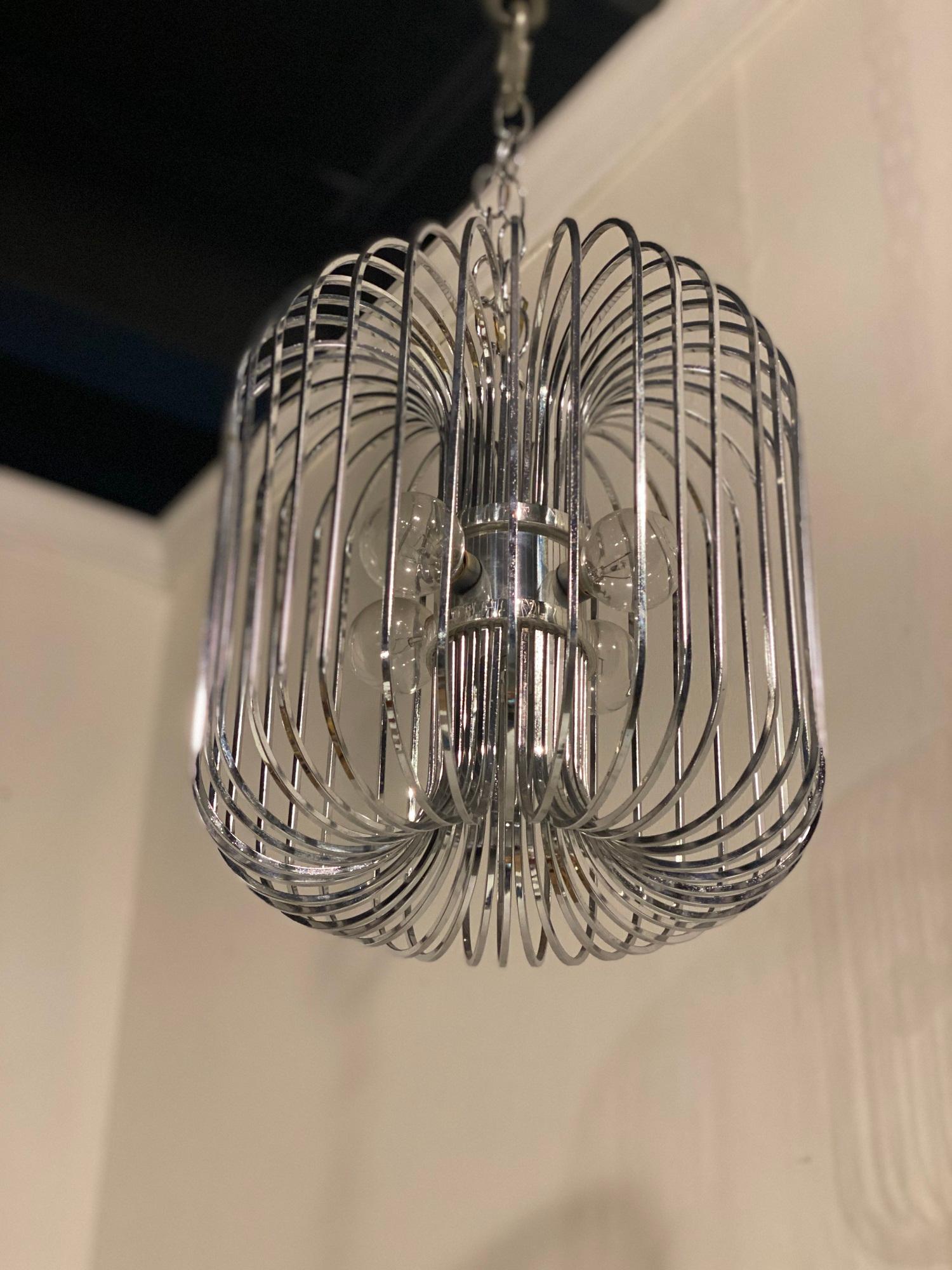 A circa 1940's French chrome light fixture with interior lights 