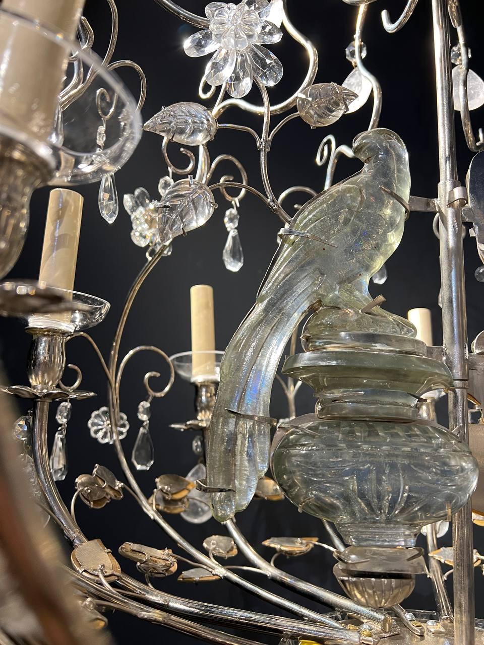 A circa 1940’s French bird cage chandelier with glass leaves and glass birds, also rock crystals hanging on 8 lights 