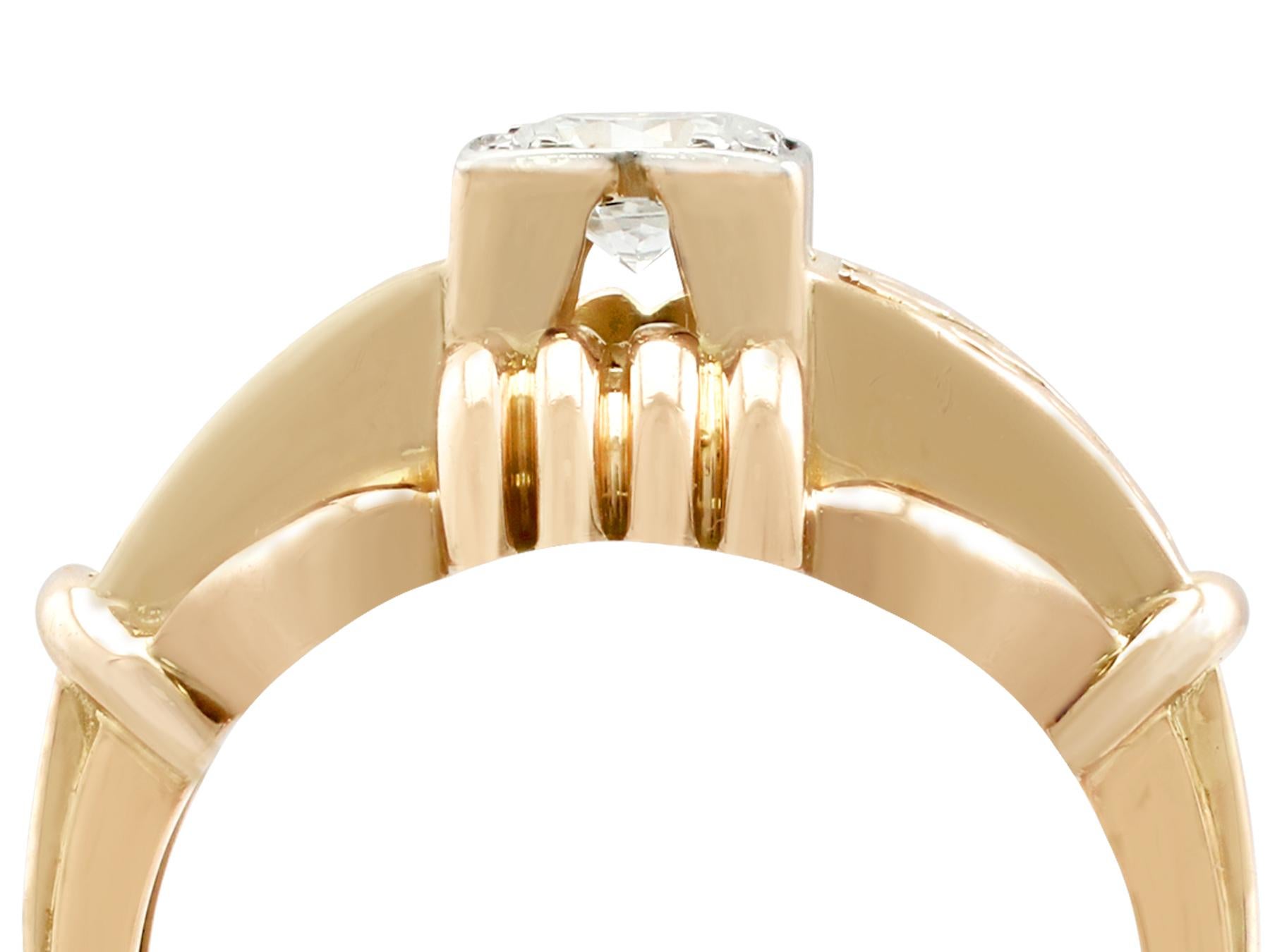An impressive vintage French 0.28 carat diamond and 18 karat yellow gold, platinum set cocktail ring; part of our diverse diamond jewelry and estate jewelry collections.

This fine and impressive 1940's gold diamond ring has been crafted in 18k