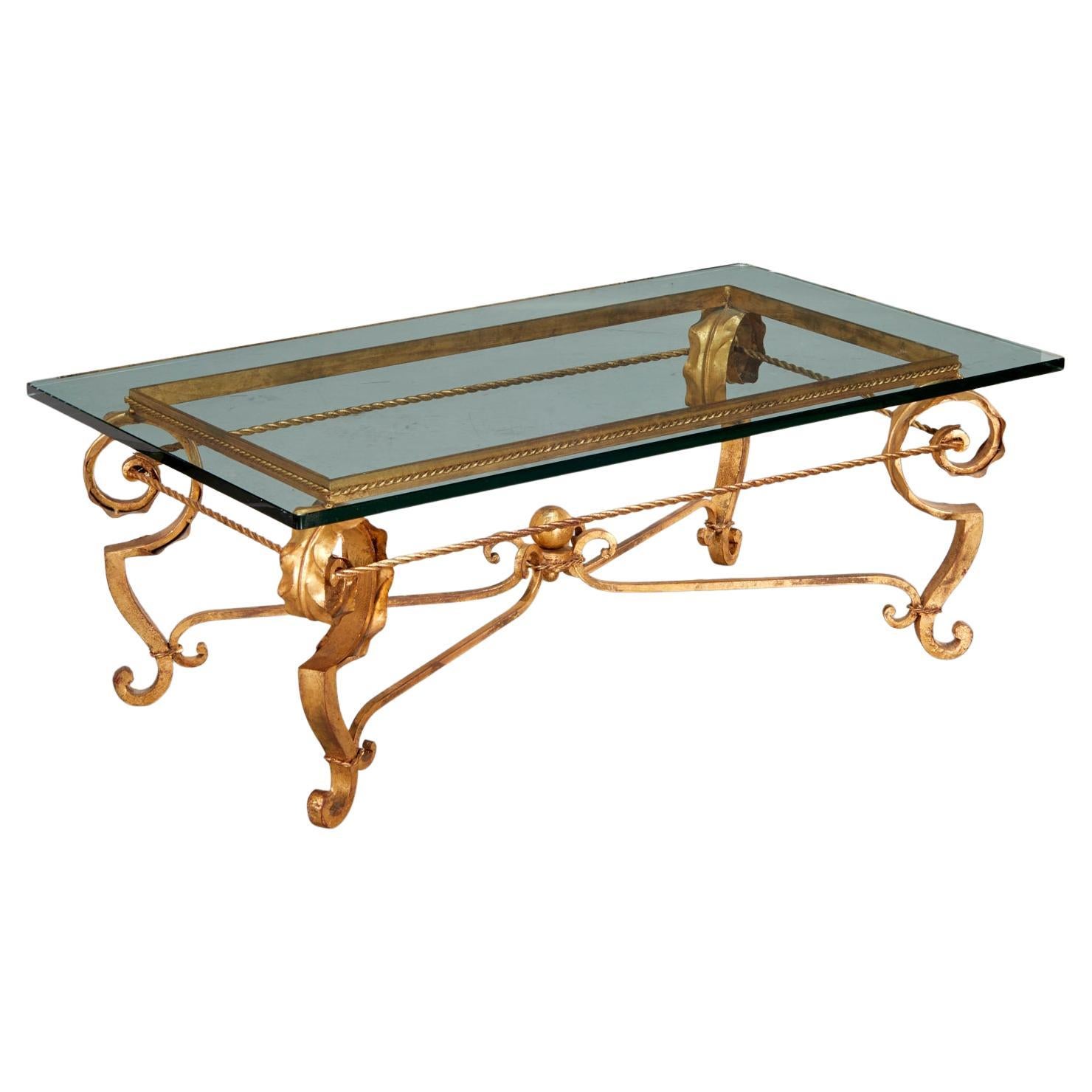 Table basse en fer doré et verre dans le style de la Maison Baguès des années 1940 en vente
