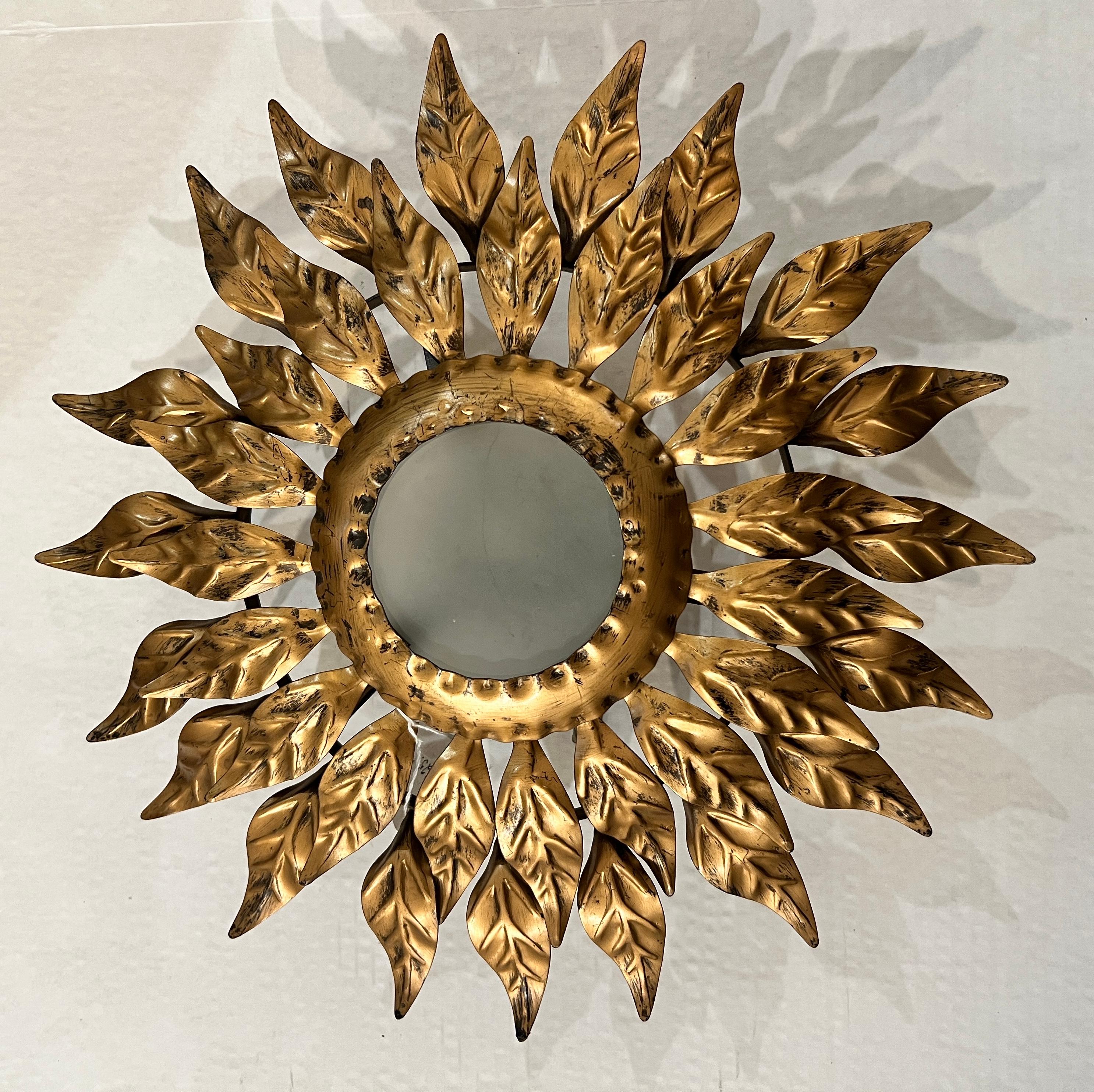 A gilt metal sunflower form light with opaque glass. All wiring has been updated for U.S. standards. The light can hand as a wall sconce or ceiling fixture


Markings on the socket:  125v 75w
Leviton Nom 057 Switch 