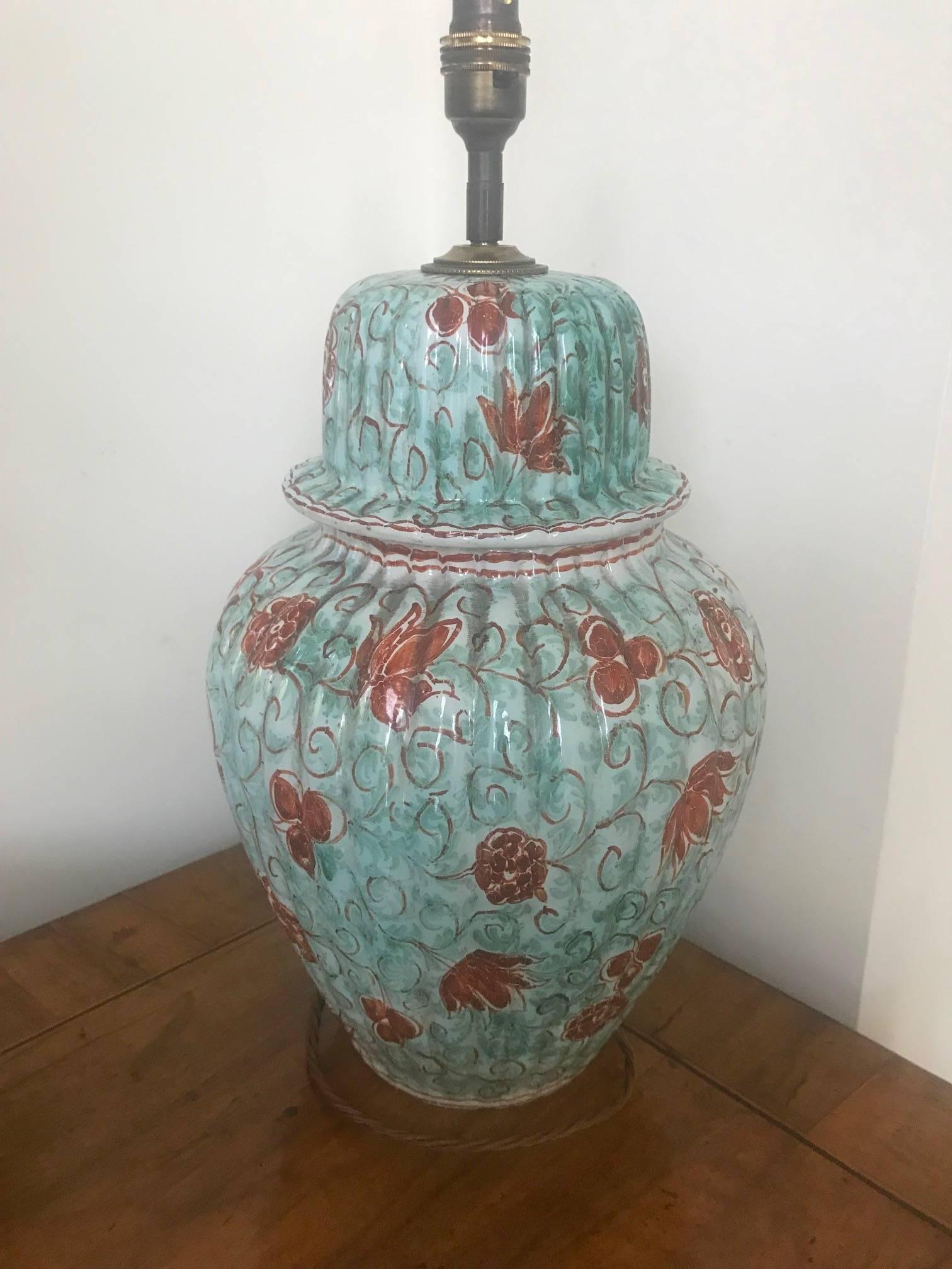 Green and burnt orange floral glazed ceramic lidded vase converted to a lamp, French, circa 1940s. Signed on the base PB