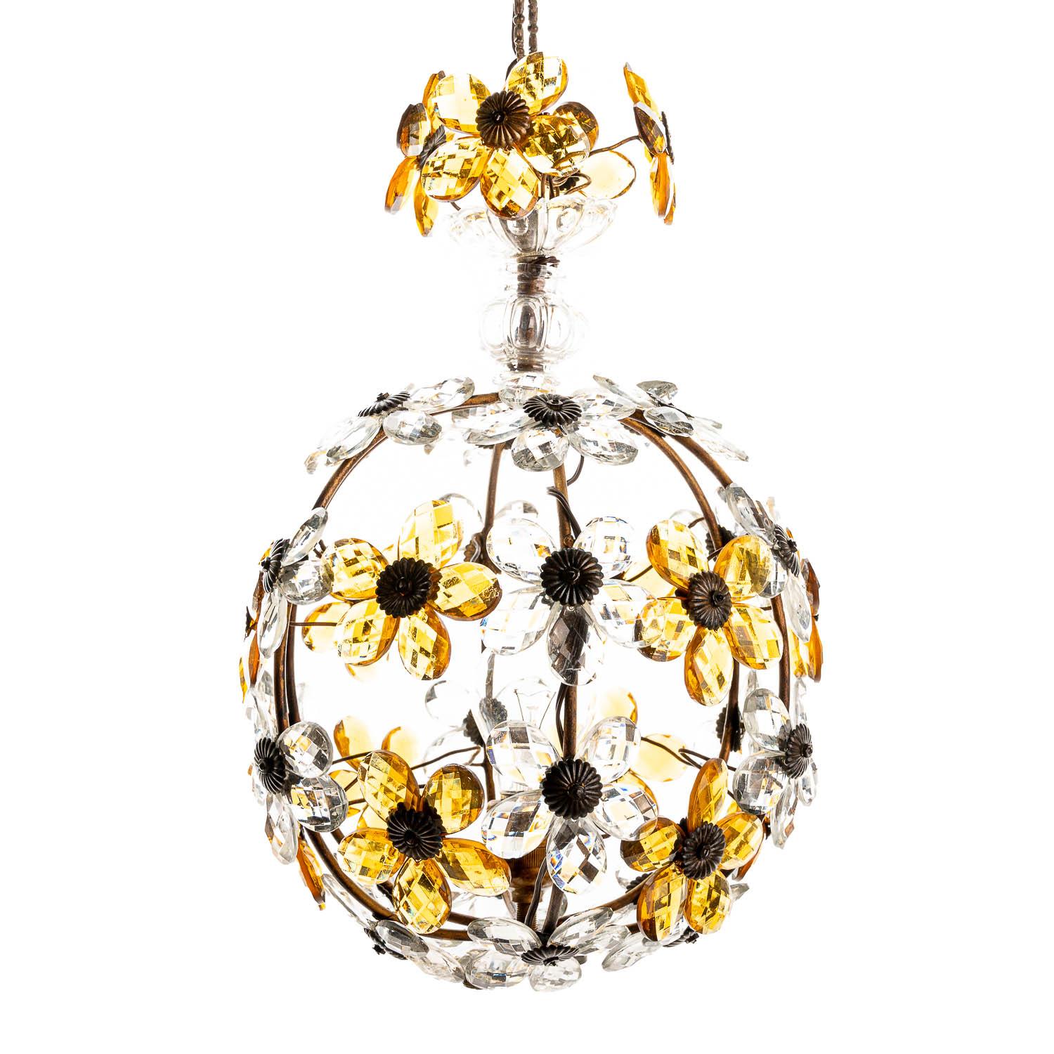 Charming gilt metal lantern with amber colored crystal glass petals creating a flower. It holds one E27 socket.
